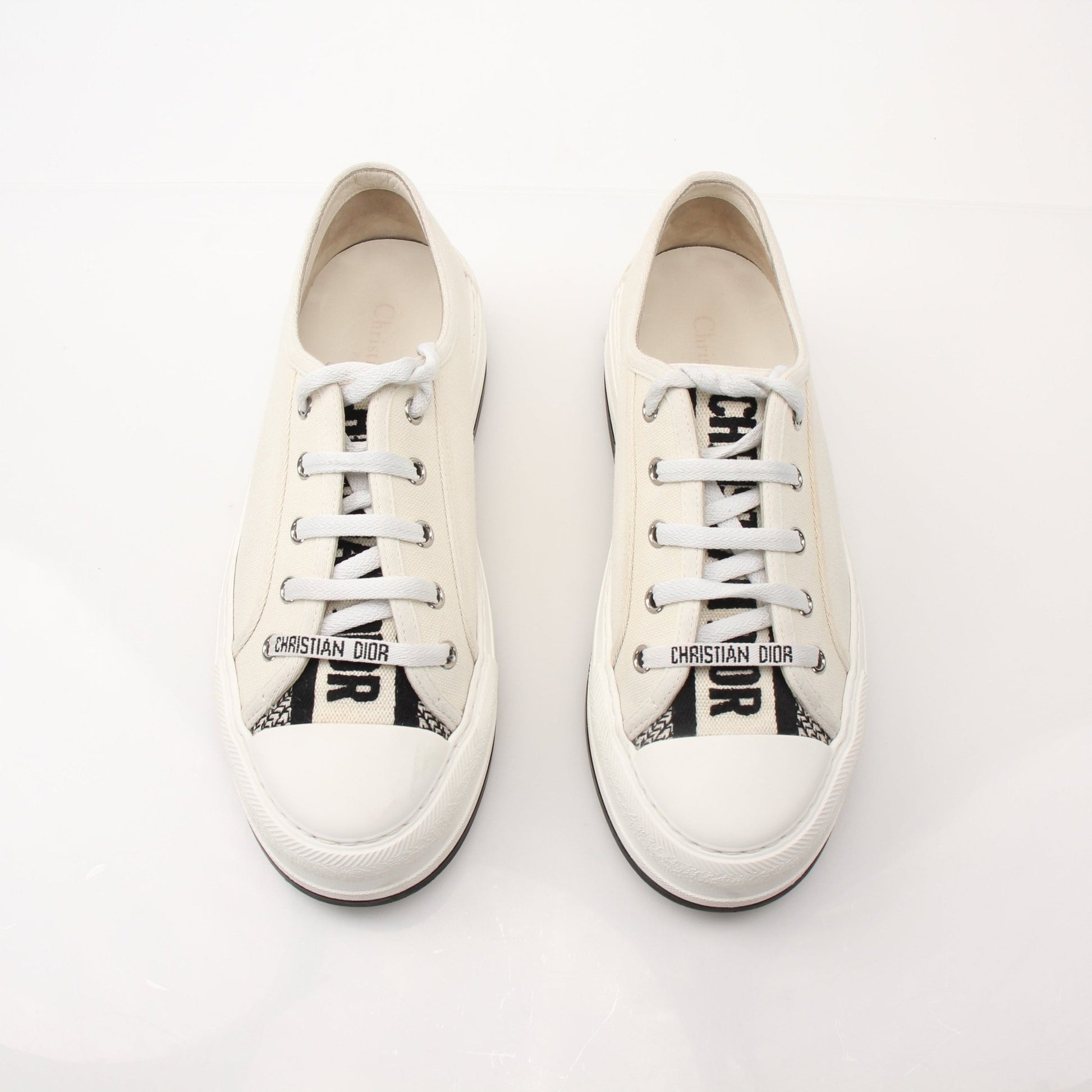 Christian Dior Walk’n’Dior platform sneakers by Gold & Beyond featuring white shoes with chunky soles and stylish design details.
