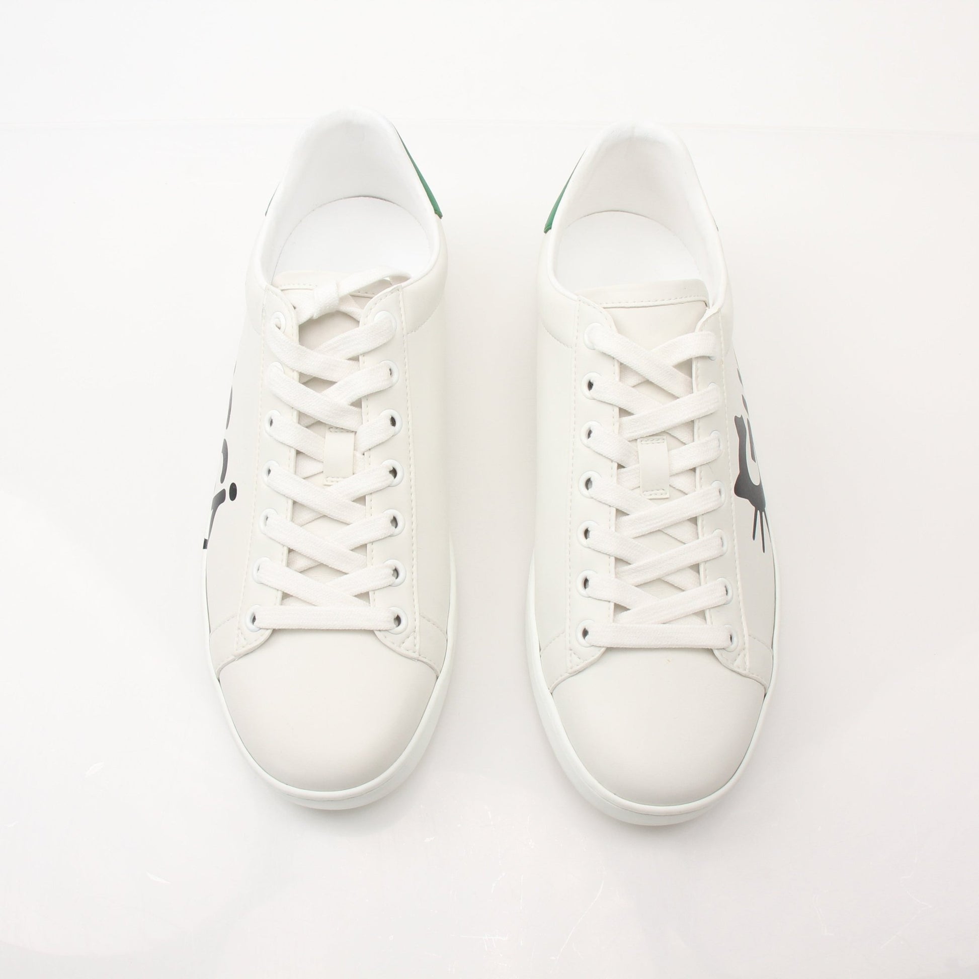 Gold & Beyond Gucci women’s Ace kitten logo sneakers featuring stylish designer shoes with signature branding and slip-on design.