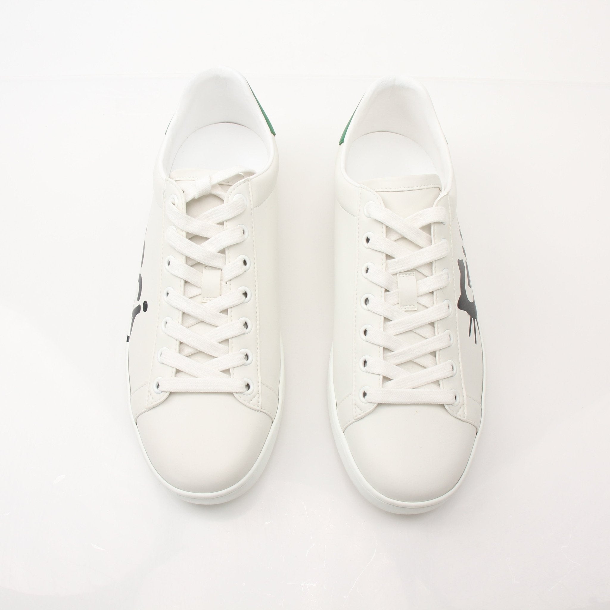 Gold & Beyond Gucci women’s Ace kitten logo sneakers featuring stylish designer shoes with signature branding and slip-on design.