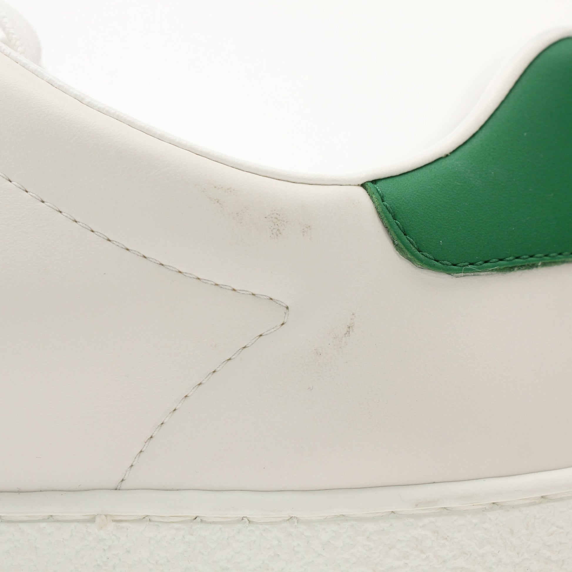 Gold & Beyond Gucci Women’s Ace Kitten Logo Sneakers, stylish shoes with iconic GG logo and sleek design on a white background.