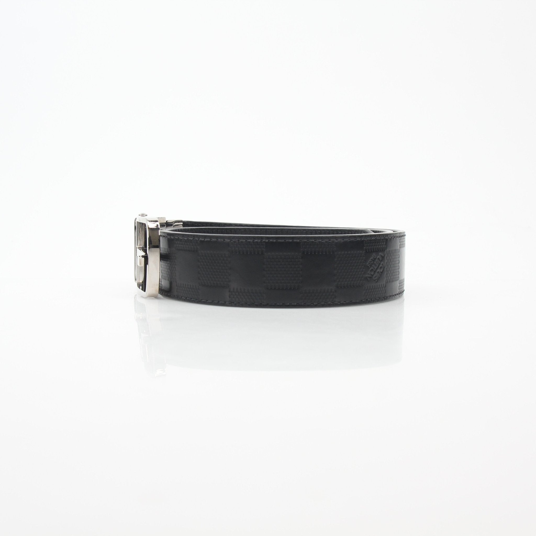 Louis Vuitton Damier Infini Ceinture Boston belt in black with gold accents, showcasing the designer logo and textured pattern.