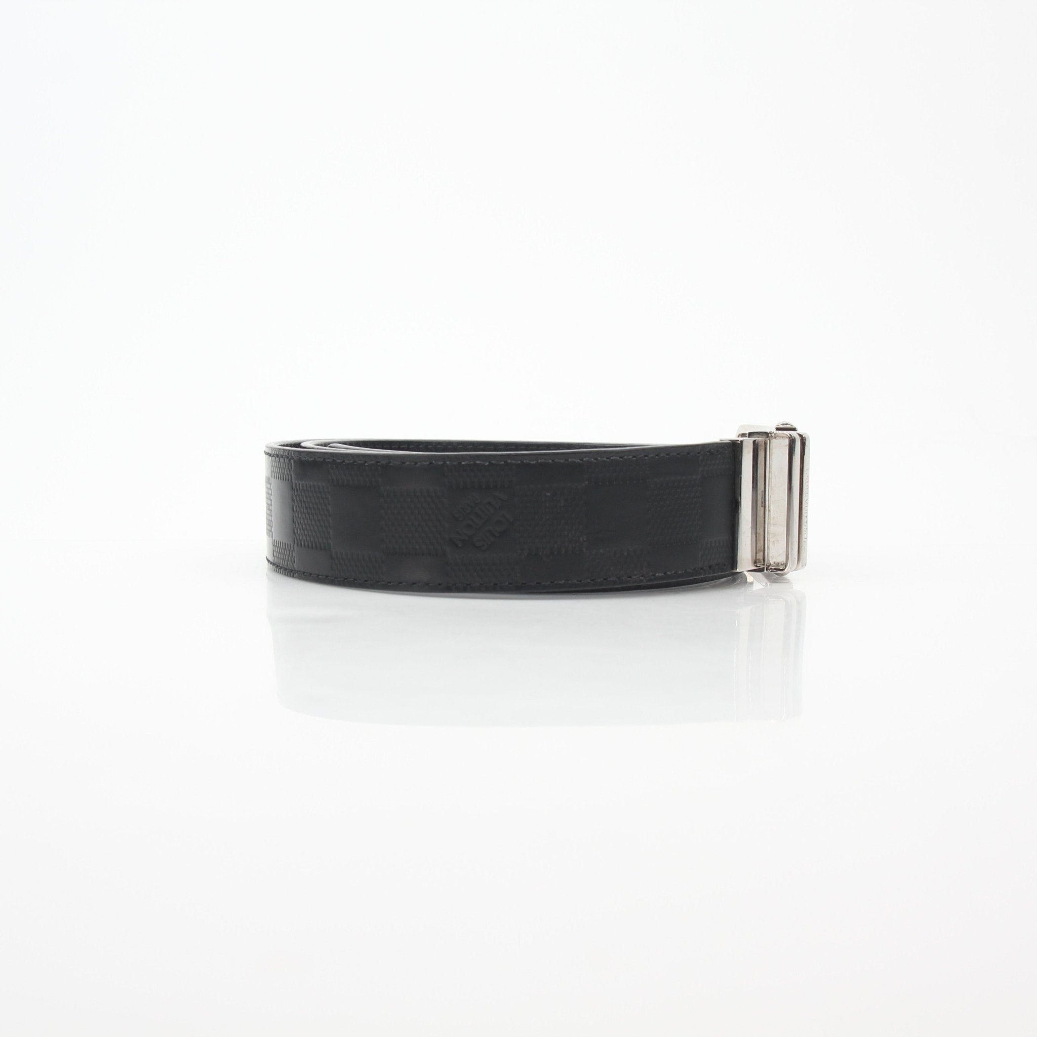 Louis Vuitton black Damier Infini Ceinture Boston belt with gold accents, stylish accessories for men or women.