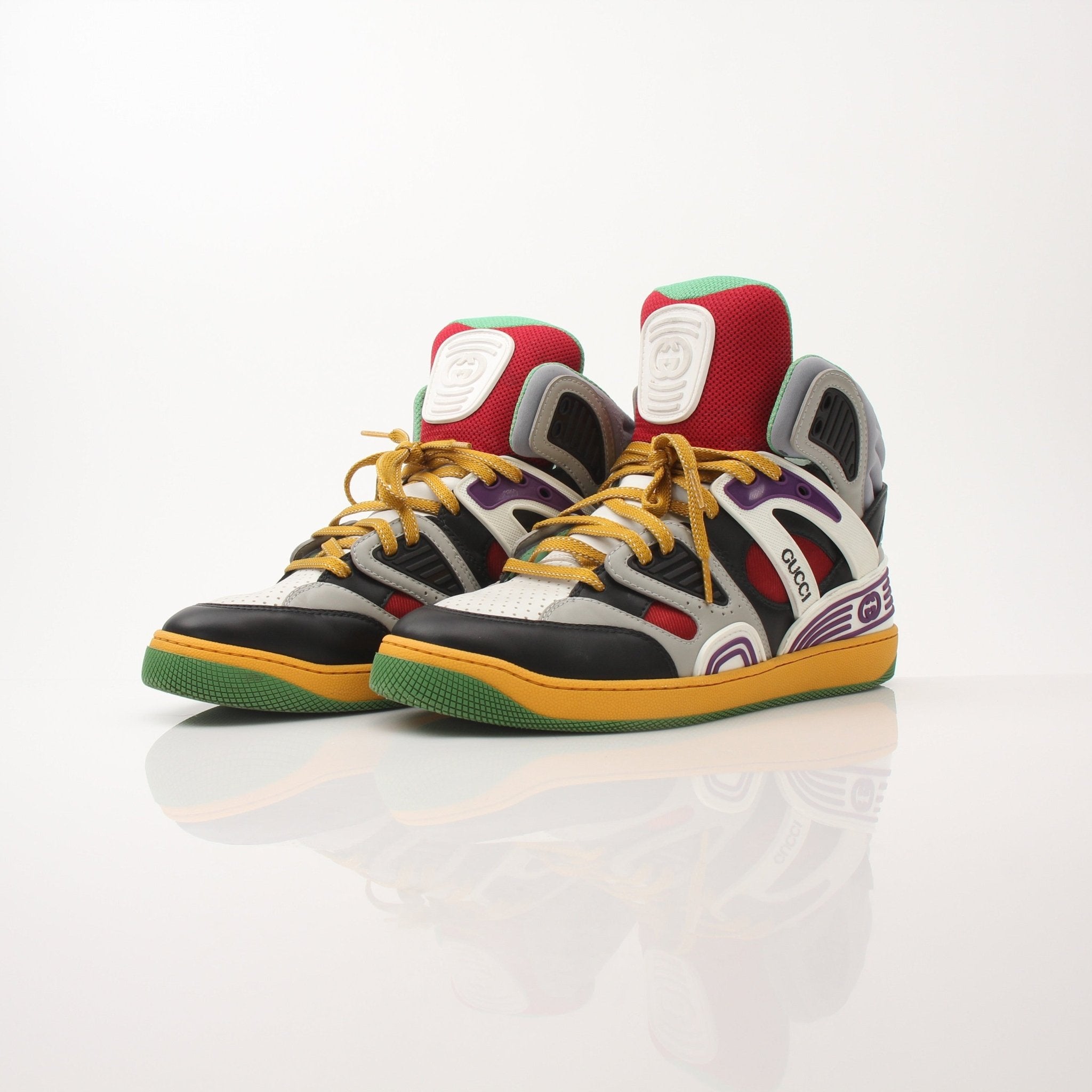 Gold & Beyond Gucci men's high top basketball sneakers with stylish design and sporty look, featuring branding and modern athletic details.