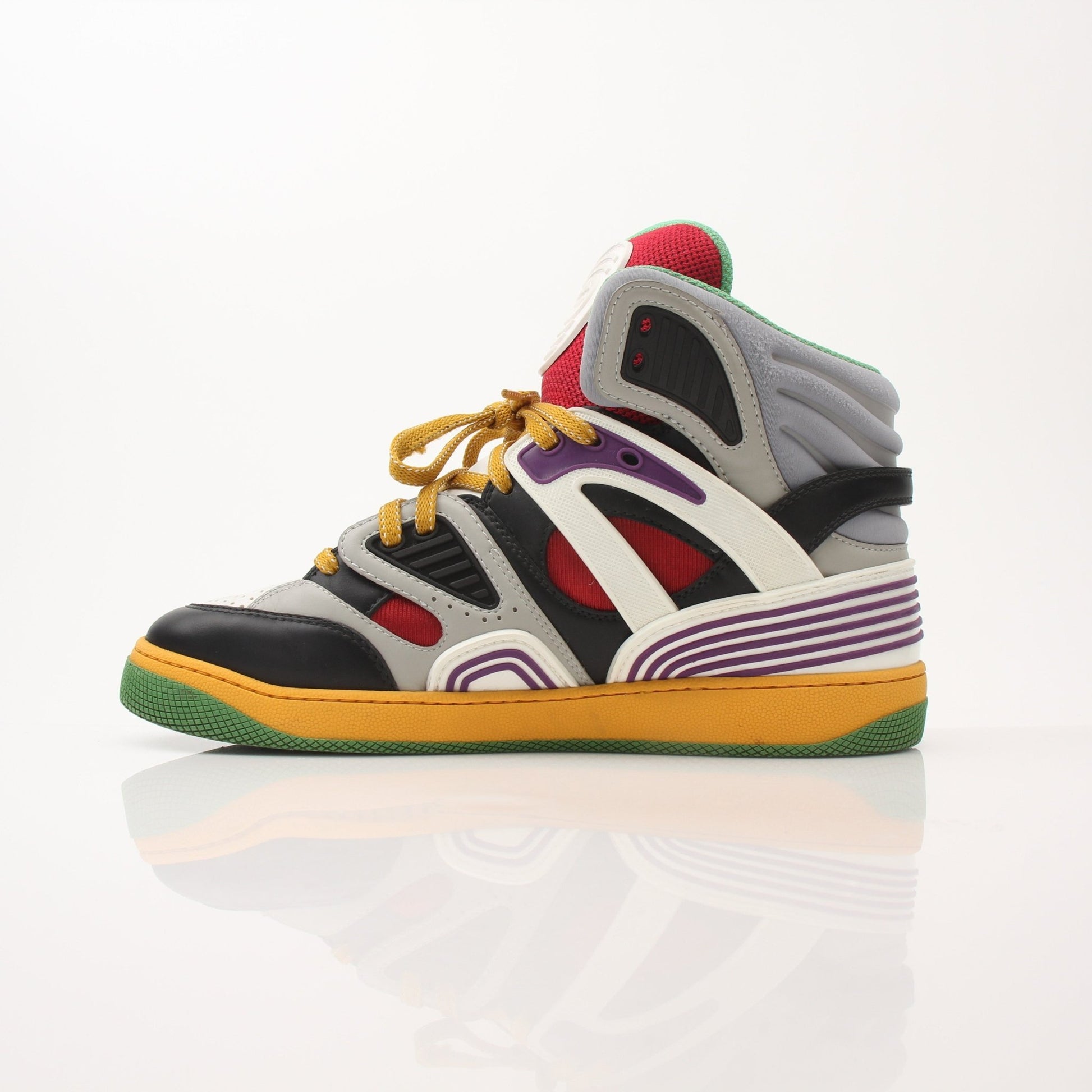 Gold & Beyond Gucci men's basketball high top sneakers featuring stylish design and durable construction.