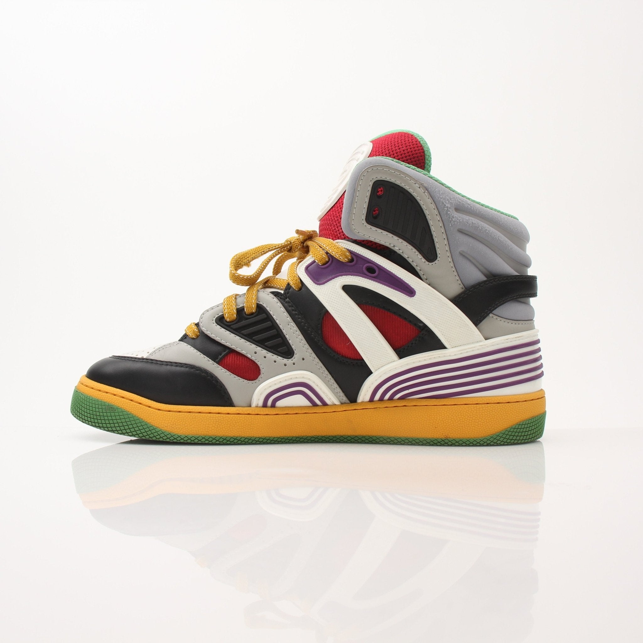 Gold & Beyond Gucci men's basketball high top sneakers featuring stylish design and durable construction.