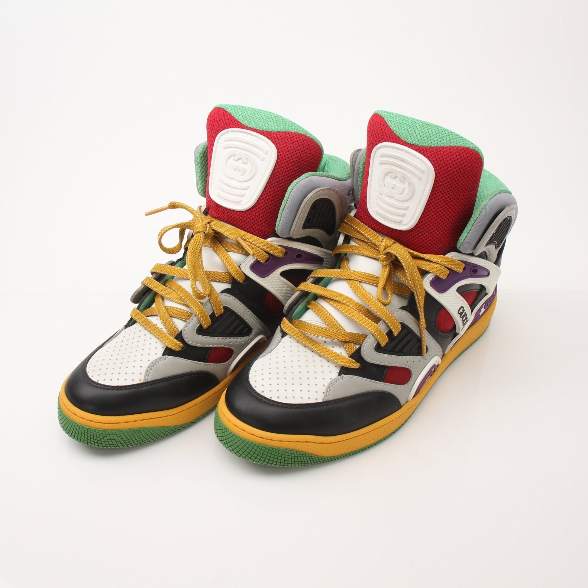 Gold & Beyond Gucci men's high-top basketball sneakers with stylish design and sporty look, featuring classic branding and athletic details.
