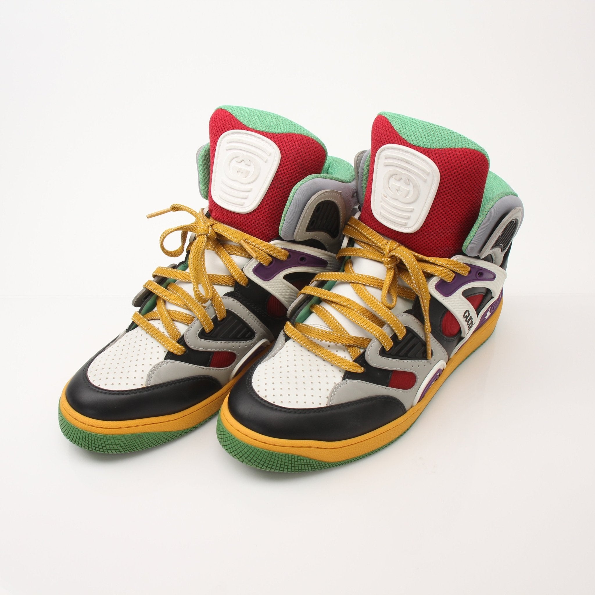 Gold & Beyond Gucci men's high-top basketball sneakers with stylish design and sporty look, featuring classic branding and athletic details.