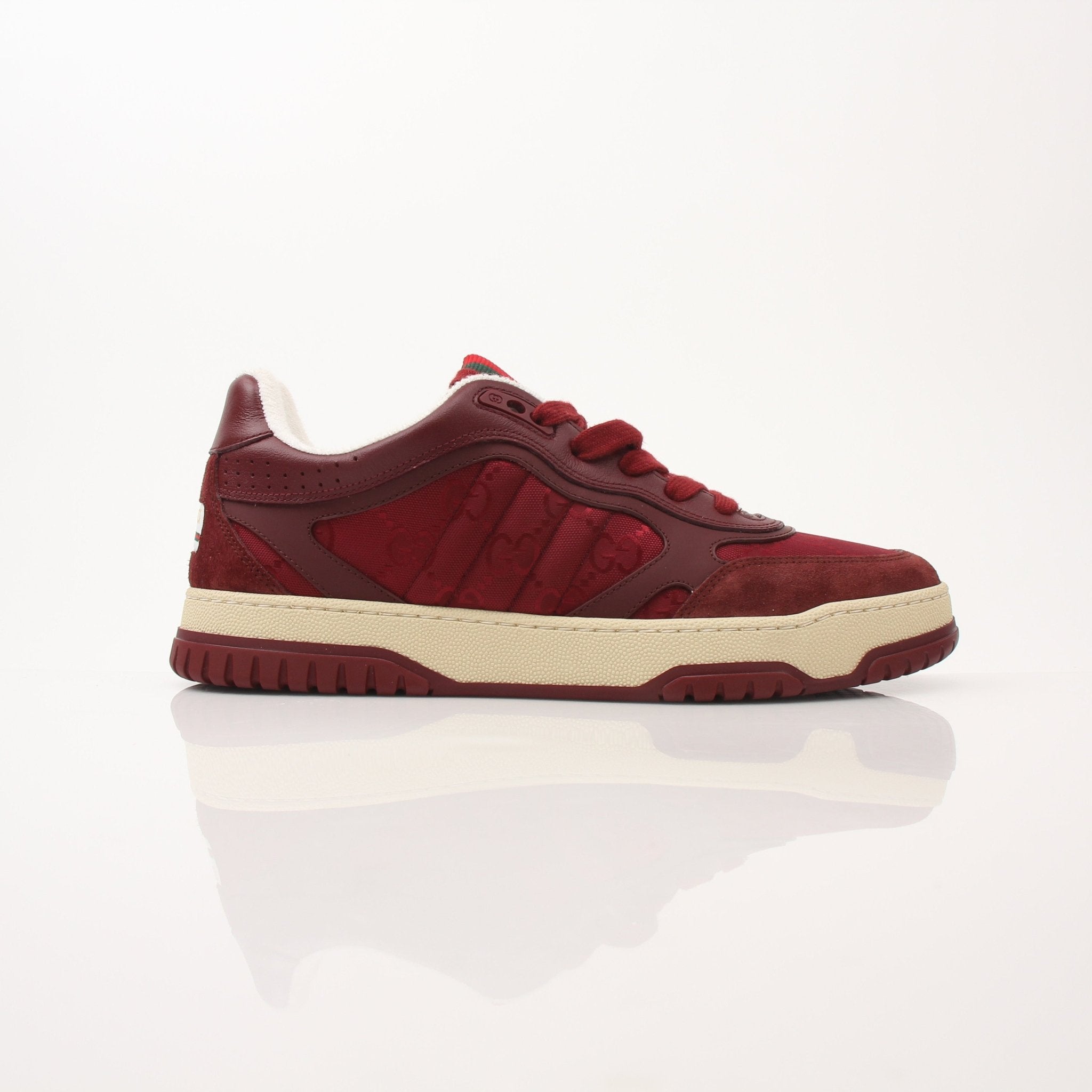 Gold & Beyond Gucci men's Re-Web sneakers featuring white leather and green-red web detailing, casual shoe with sporty design.