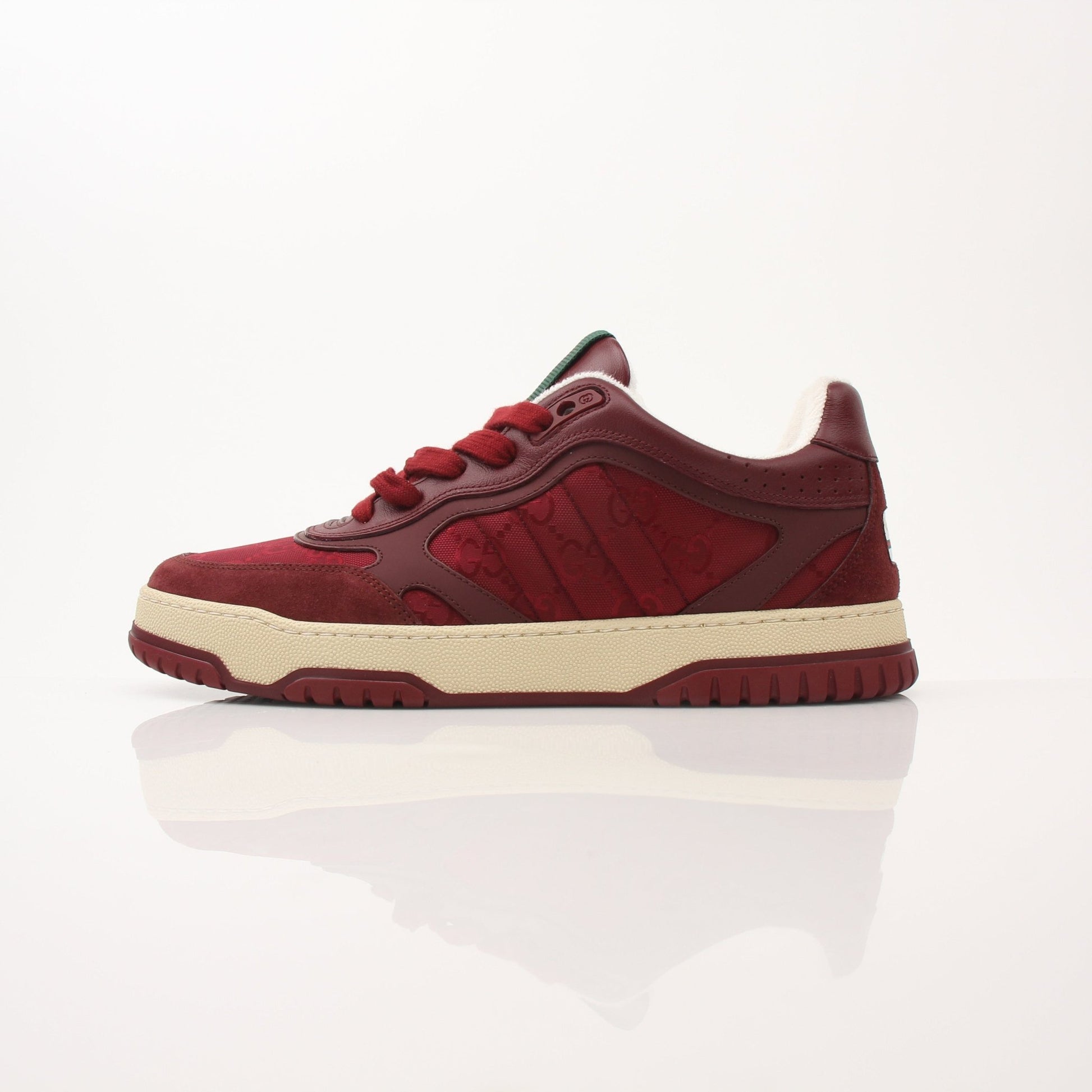 Gold & Beyond Gucci Men’s Re-Web Sneakers, stylish shoes featuring iconic red and green web design on comfortable sneakers.