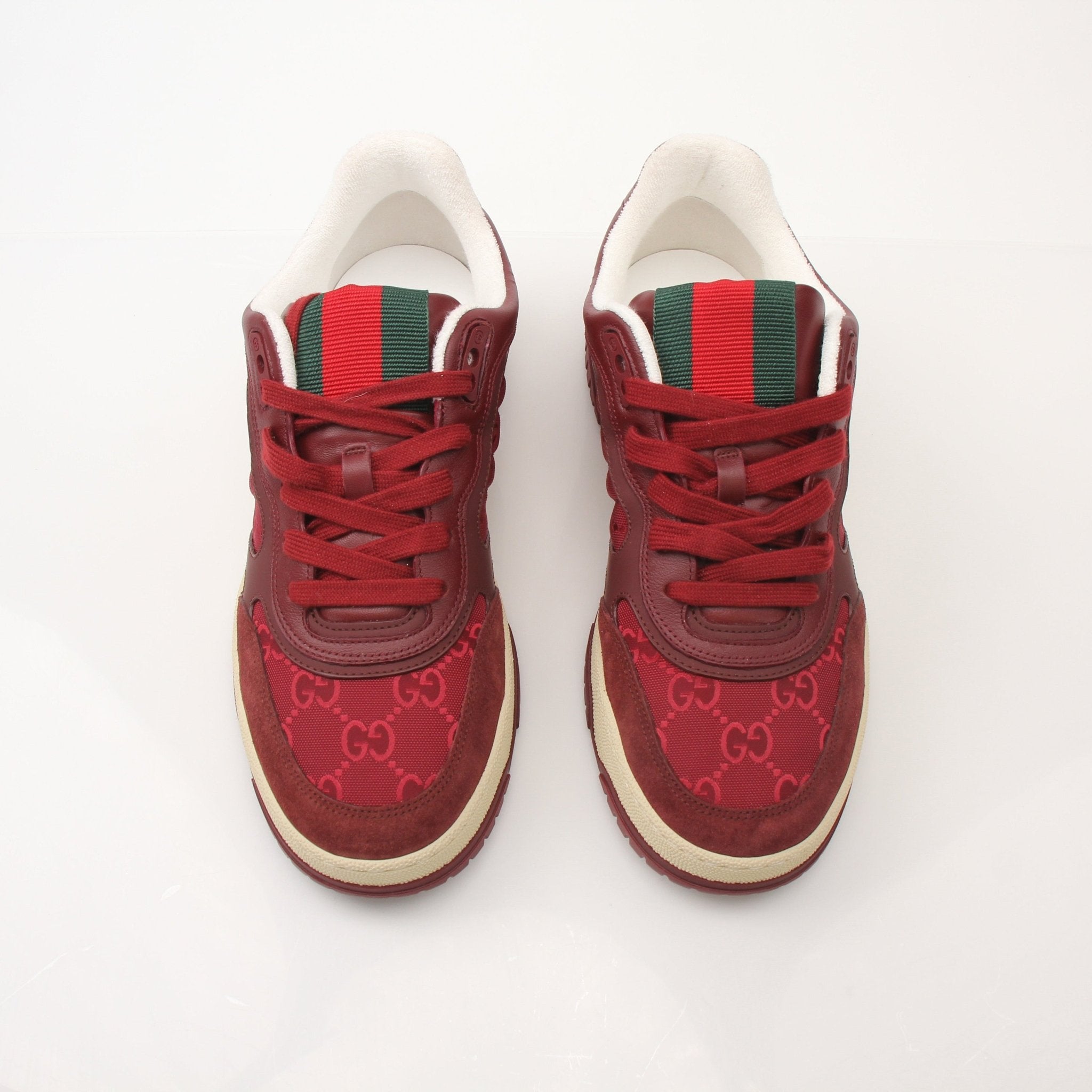 Gucci Men’s Re-Web Sneakers by Gold & Beyond showing stylish sneakers with iconic web stripe design and clean white soles.