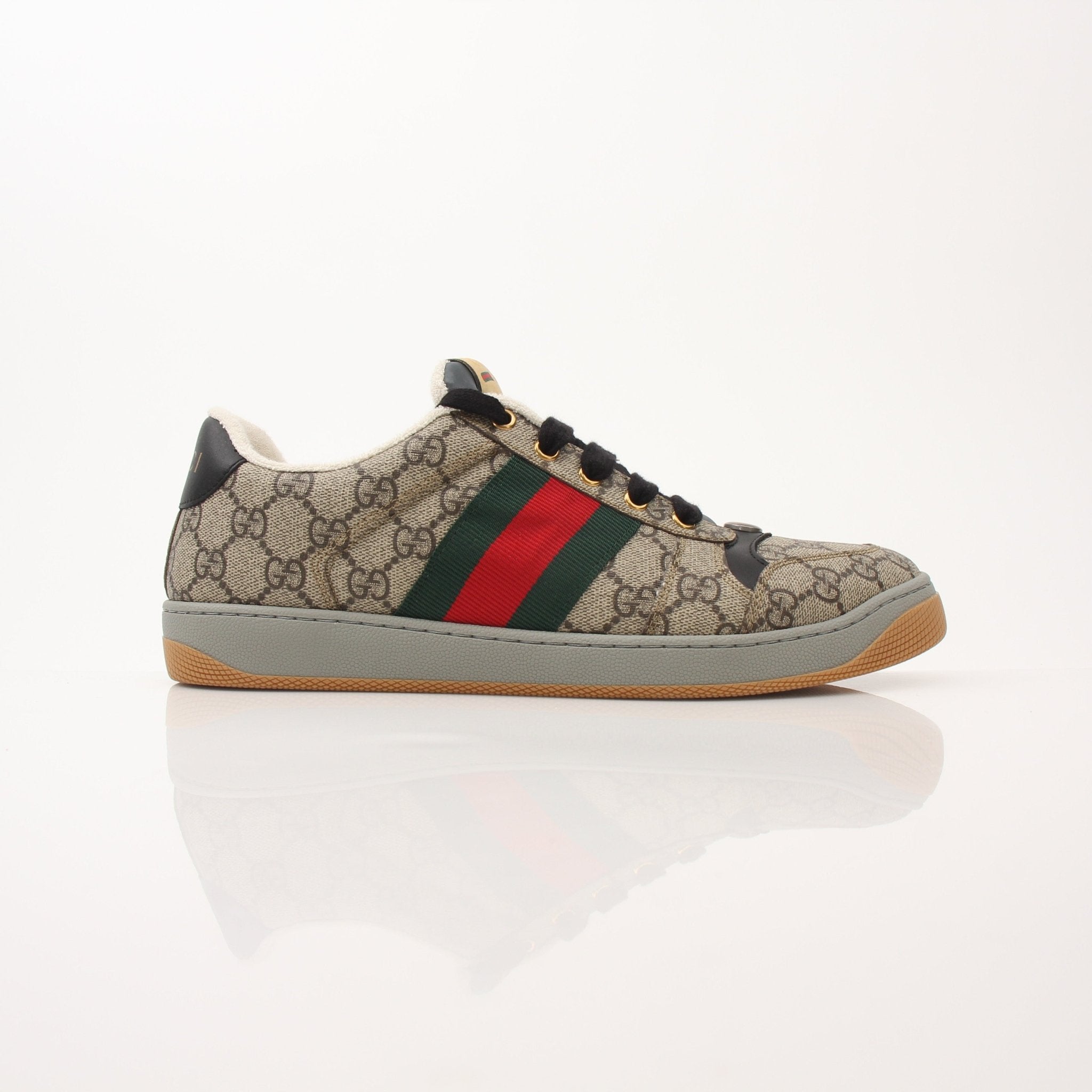 Gold & Beyond Gucci Men's Screener GG Sneakers, stylish shoes featuring signature logo design and contemporary sneaker style.