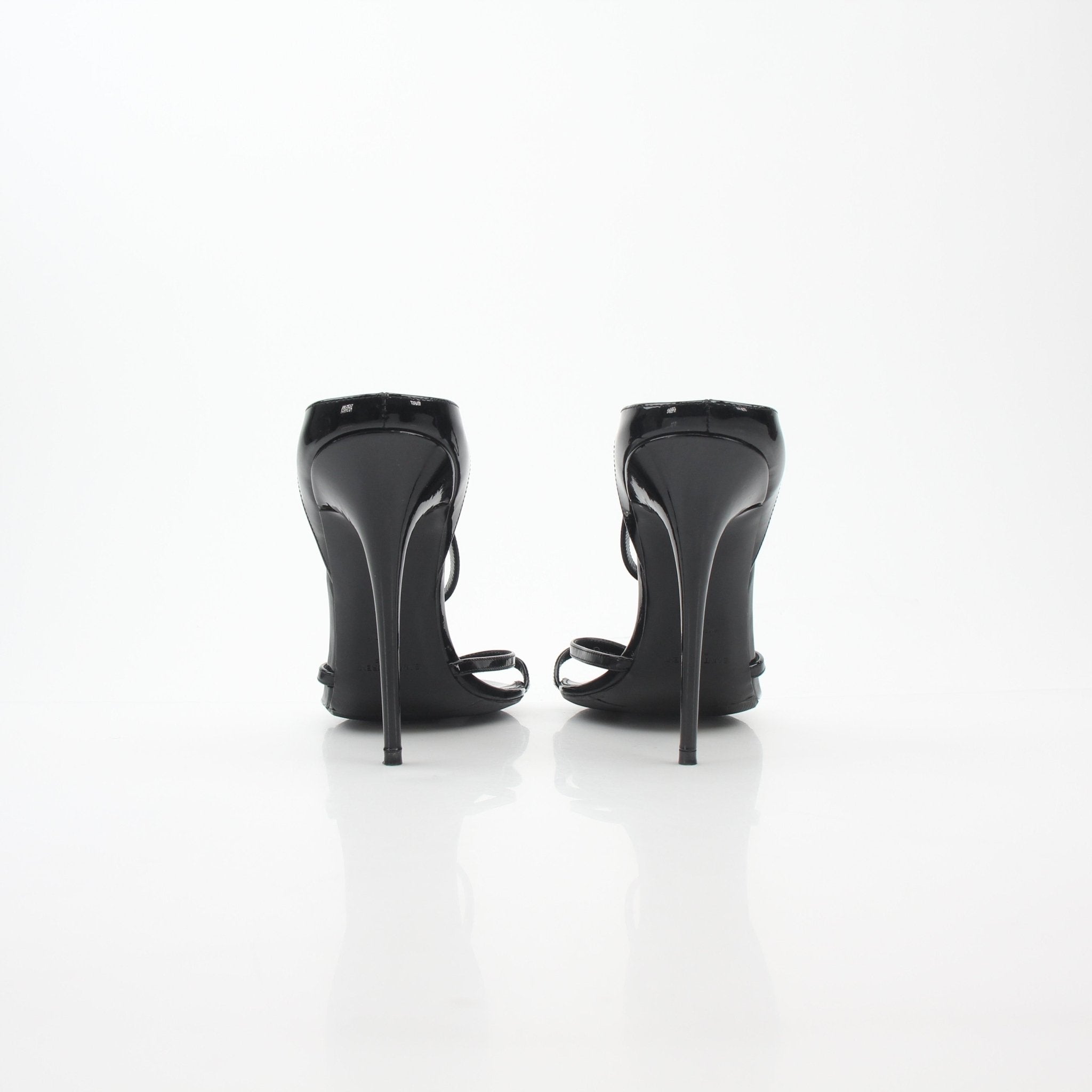 Black Saint Laurent Gippy pointed heels with sleek design, featuring stiletto style and elegant craftsmanship from Gold & Beyond.