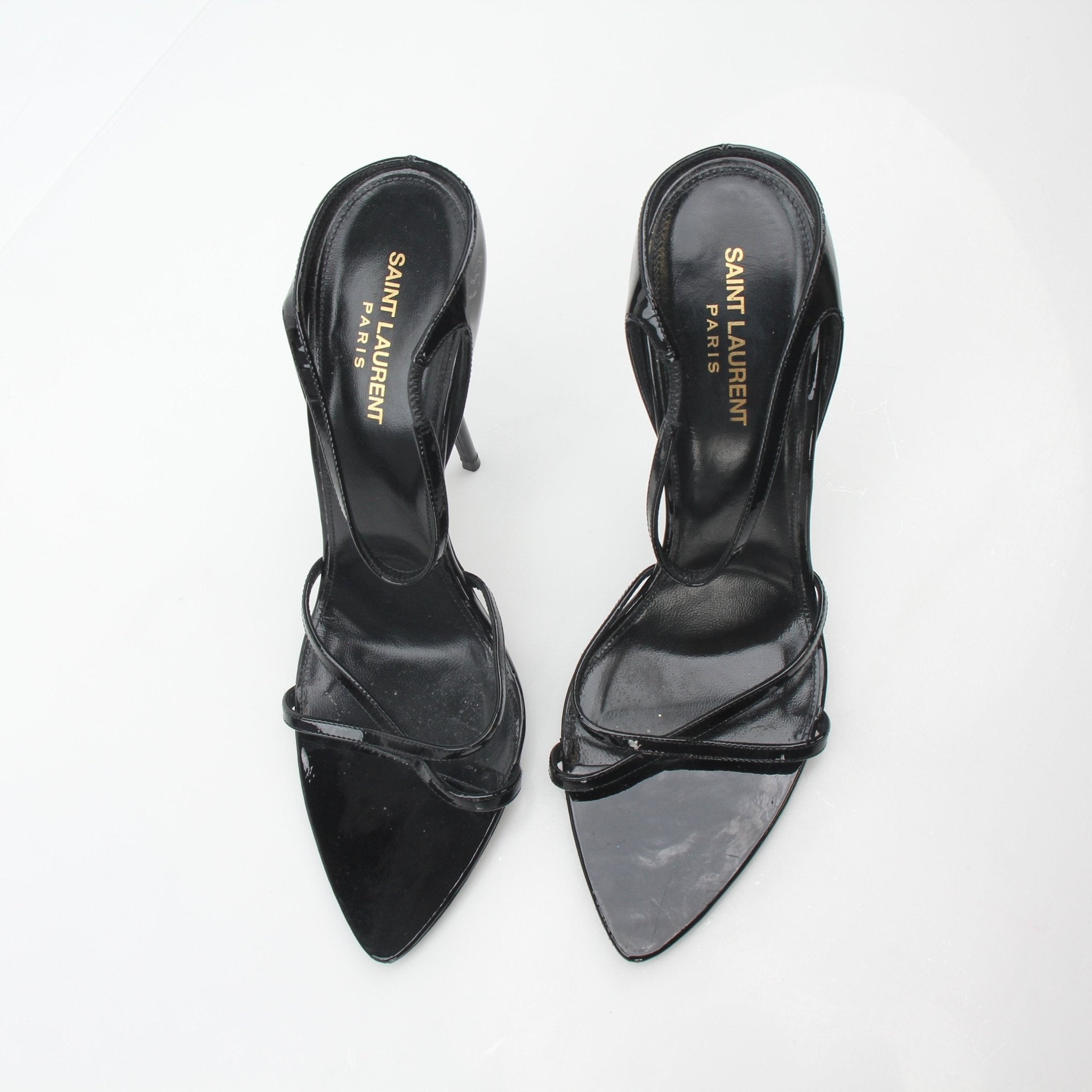 Black Saint Laurent Gippy pointed sandals with heels, featuring sleek design and elegant silhouette.