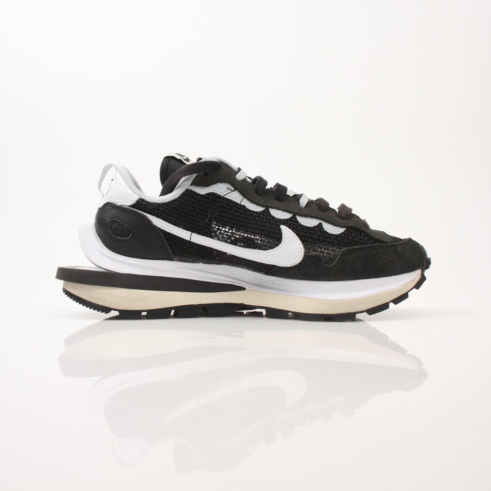 Nike x Sacai VaporWaffle sneakers for men, featuring layered design and athletic style, displayed on a neutral background.