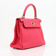 Hermès Kelly 28 Pink Togo handbag with gold hardware, featuring smooth leather and structured design, by Gold & Beyond.