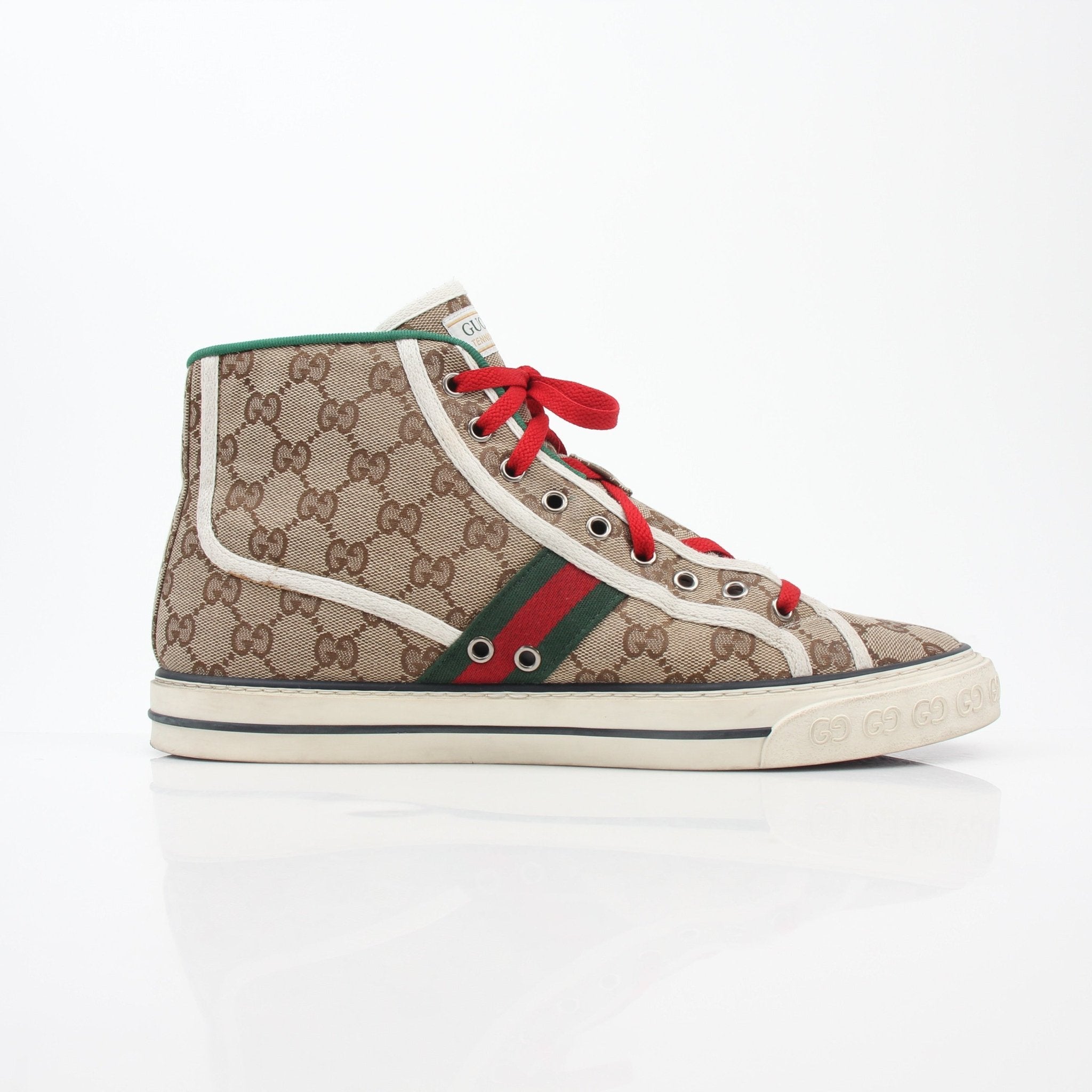 Gold & Beyond Gucci Beige Tennis 1977 high-top sneakers with leather uppers and rubber soles, showcasing classic sneaker design.