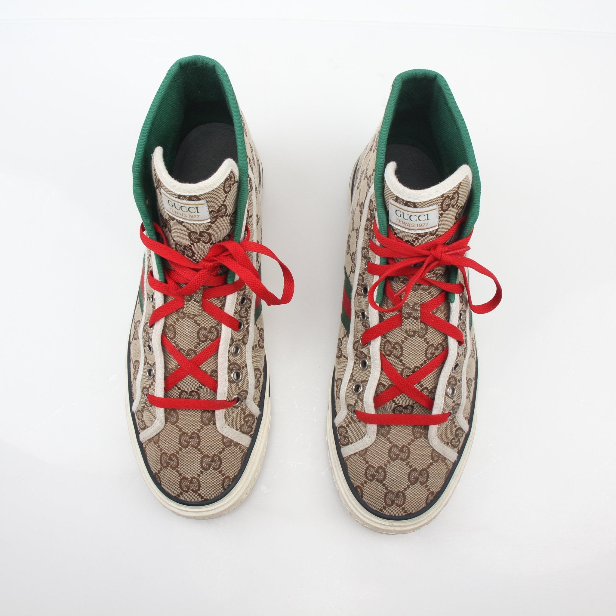 Gold & Beyond Gucci Beige Tennis 1977 high-top sneakers with laces and logo detail, styled on a clean background.