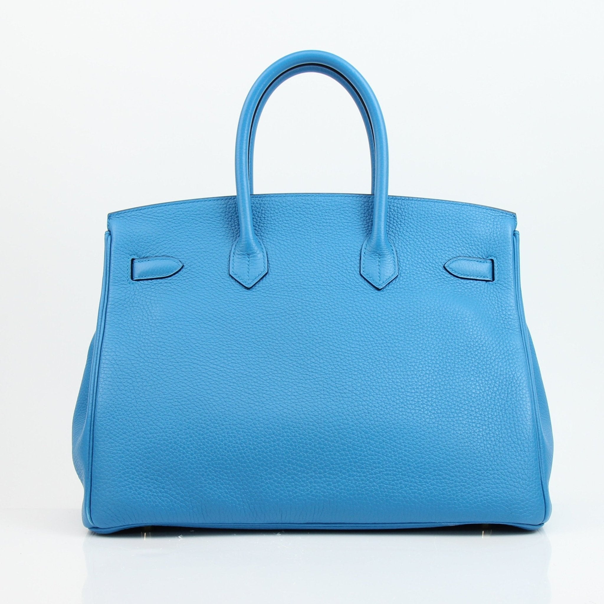 Hermès Birkin 35 Clemence handbag with gold hardware, showcasing its luxurious leather texture and elegant design.