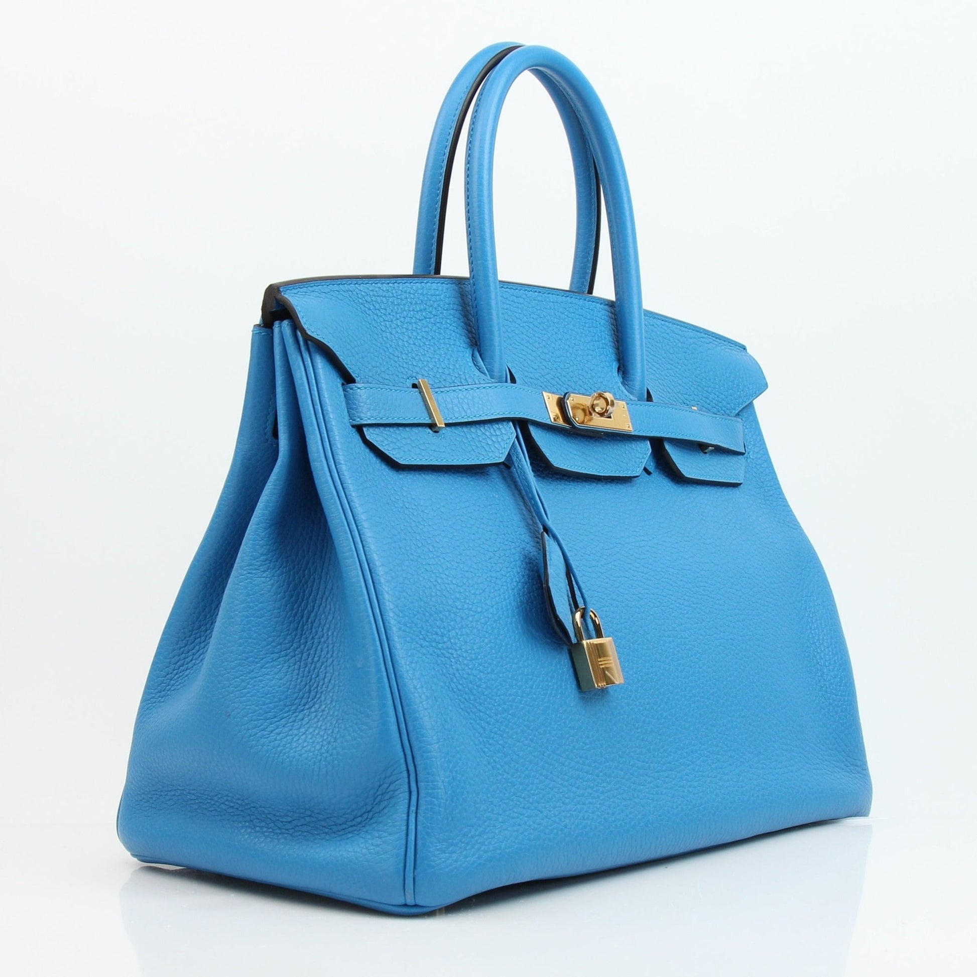 Hermès Birkin 35 Clemence handbag in tan leather, featuring structured design and gold hardware, by Gold & Beyond.