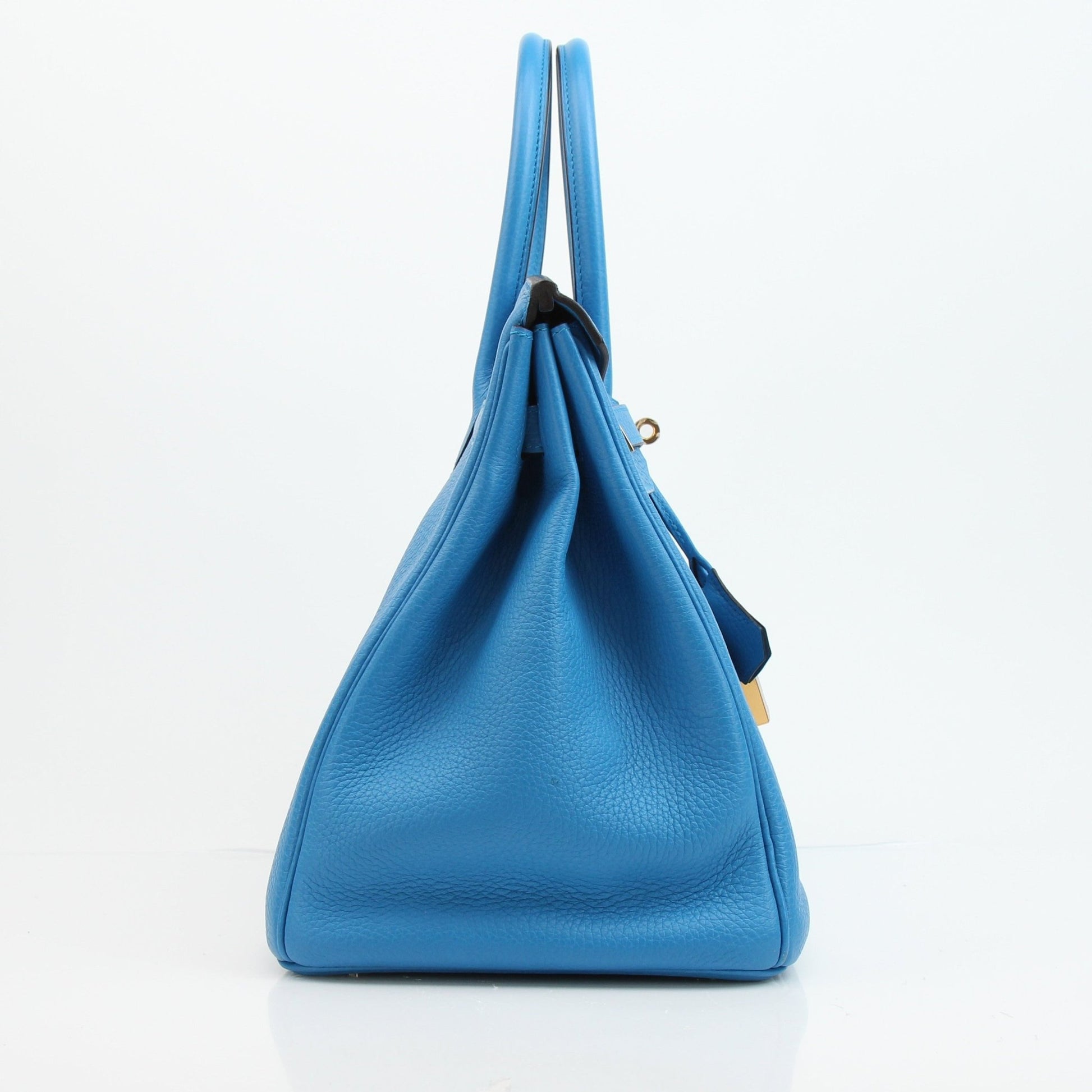 Hermès Birkin 35 Clemence handbag in natural leather with gold hardware, displayed on a neutral background.