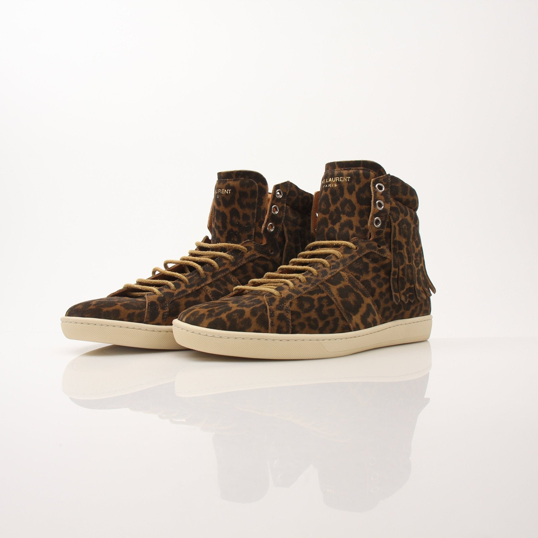 Gold & Beyond Saint Laurent Men’s SL-18 Fringe High Top Sneakers, black leather shoes with fringe detailing and high-top design.
