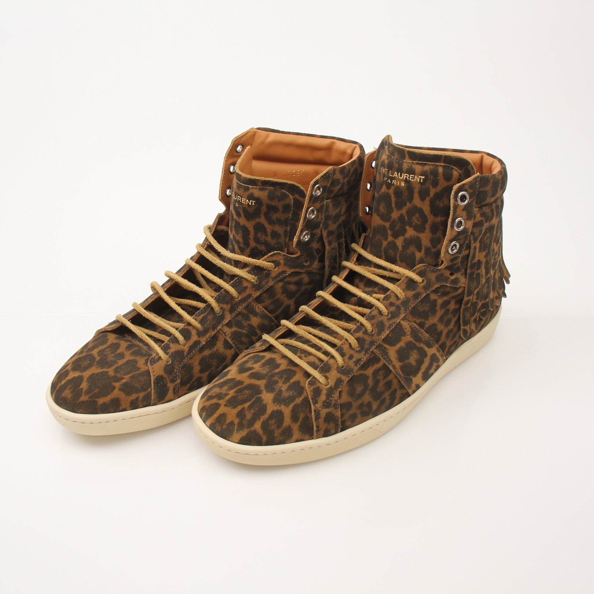 Gold & Beyond Saint Laurent Men’s SL-18 Fringe High Top Sneakers with black leather and fringe detailing, side view.