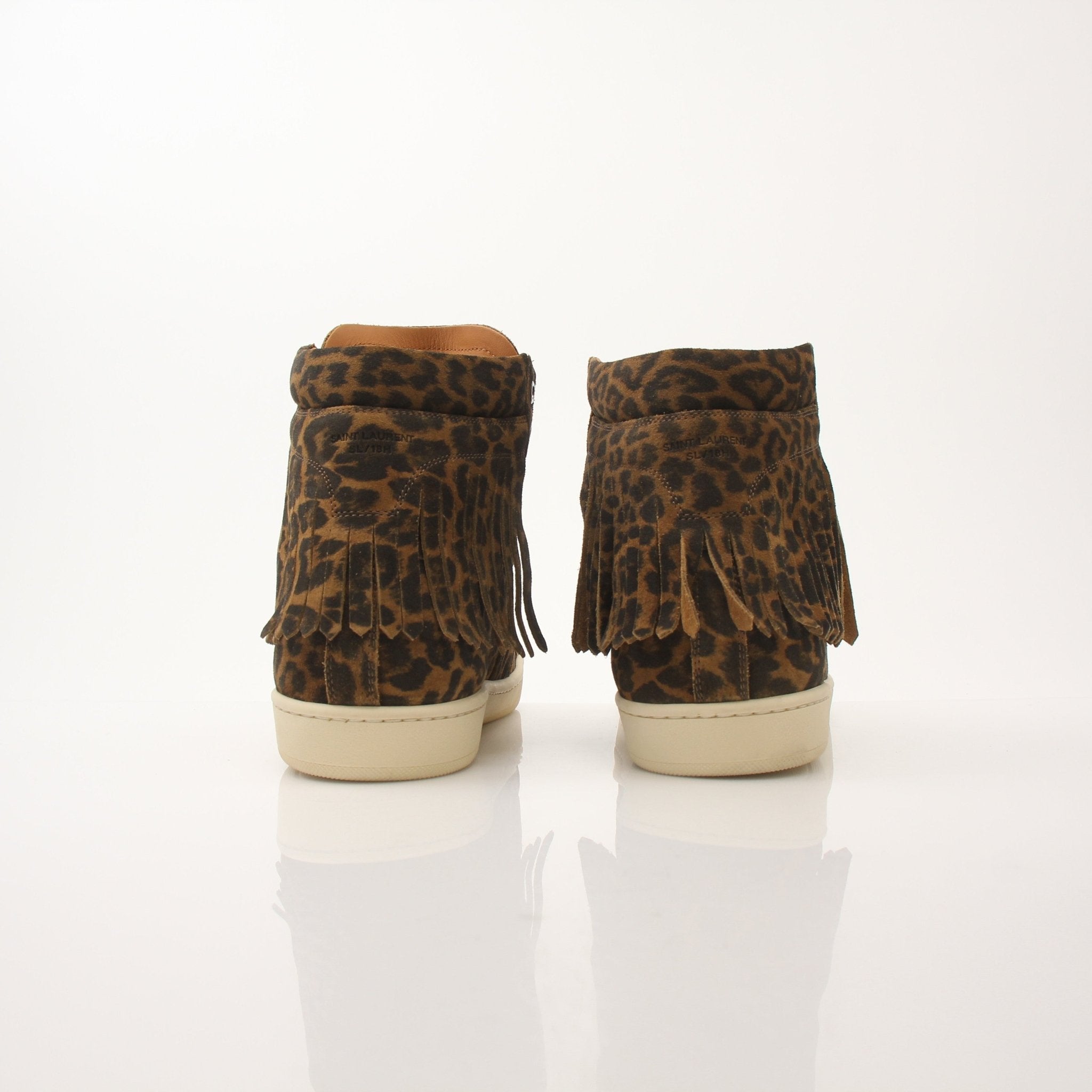 Gold & Beyond Saint Laurent Men’s SL-18 Fringe High Top Sneakers showing black leather shoes with fringe details and high-top design.