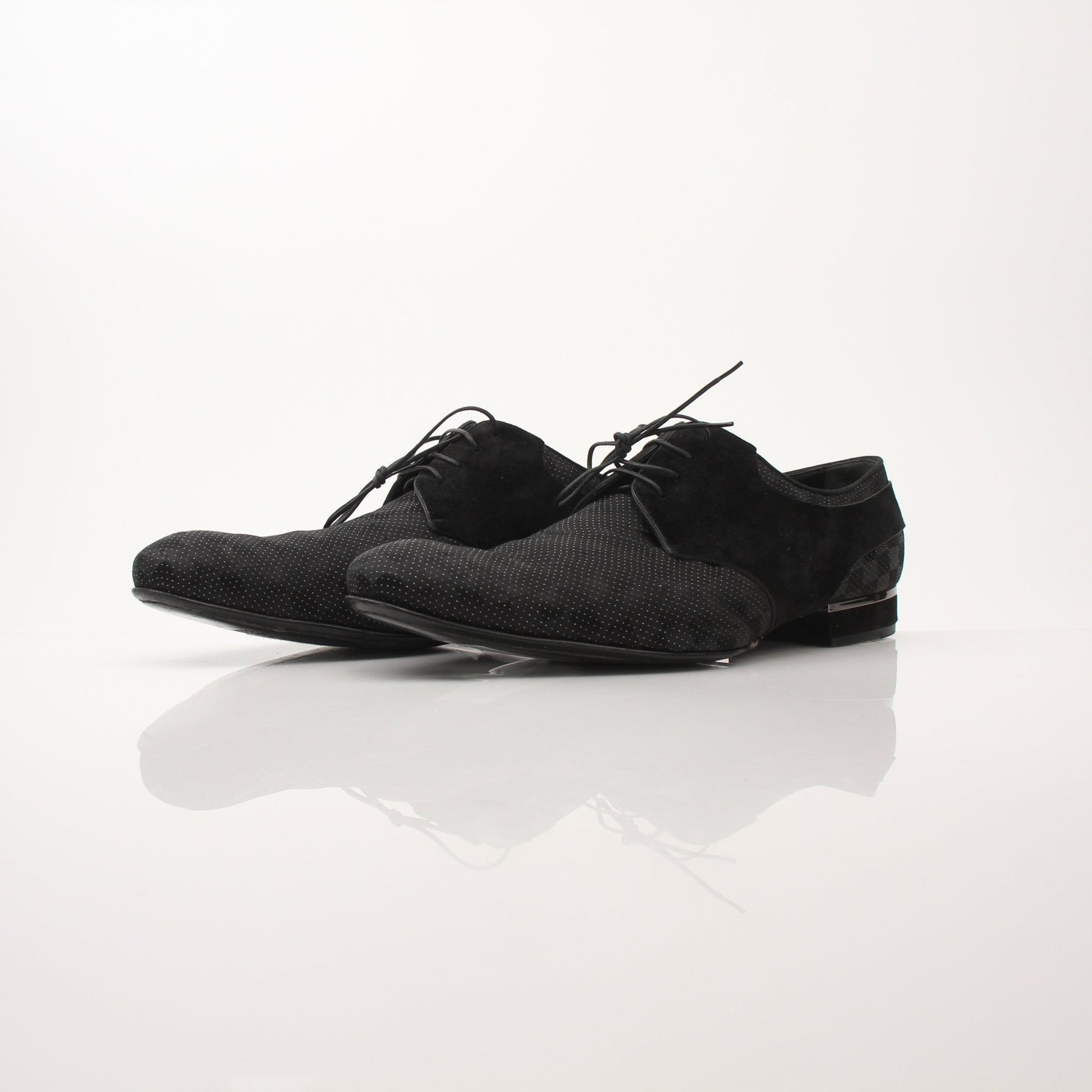 Louis Vuitton men's textured fabric derby shoes with sleek design and leather soles, displayed on a neutral background.