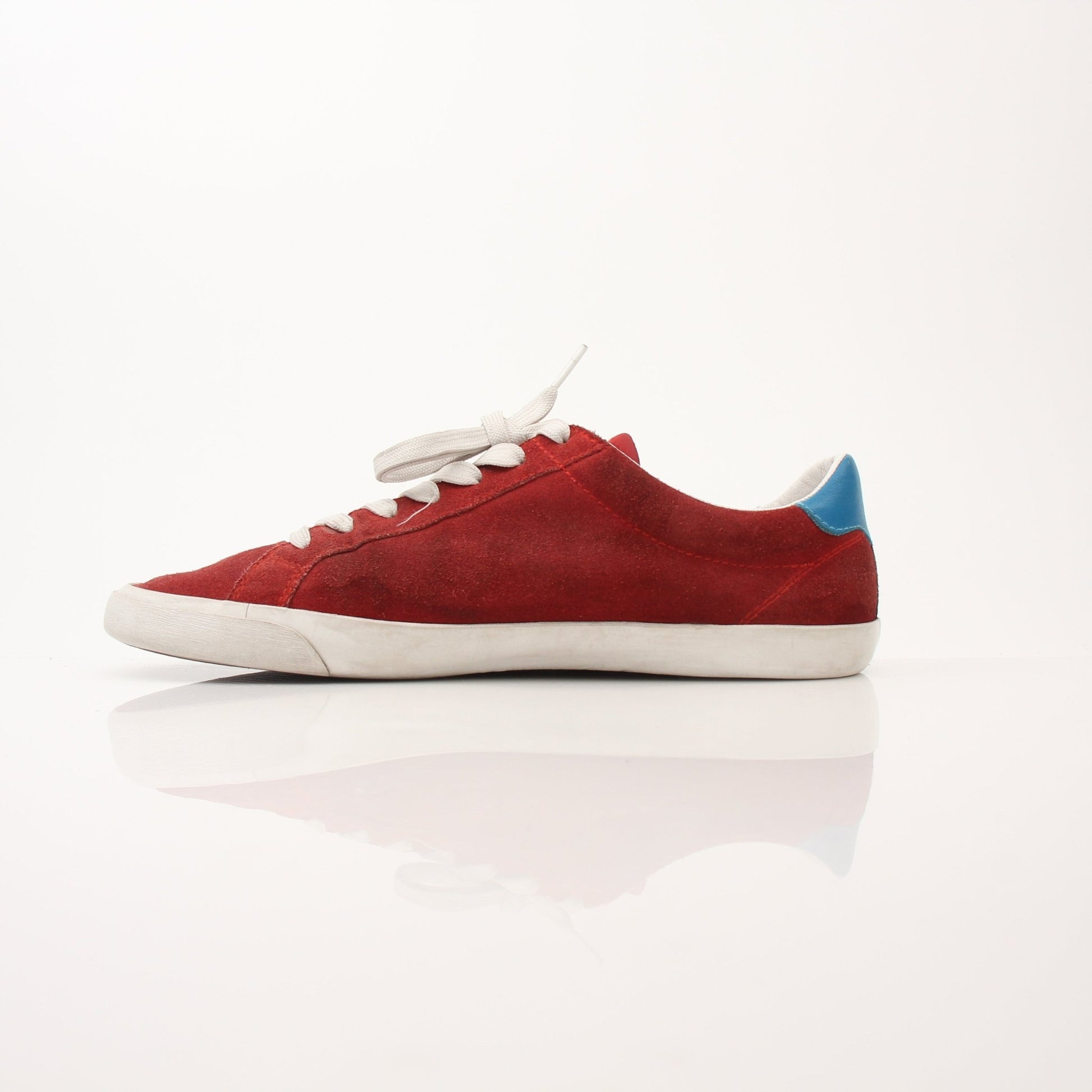 Gold & Beyond men's Dolce & Gabbana flat skating sneakers with stylish design, white leather upper, and skate-inspired sole.