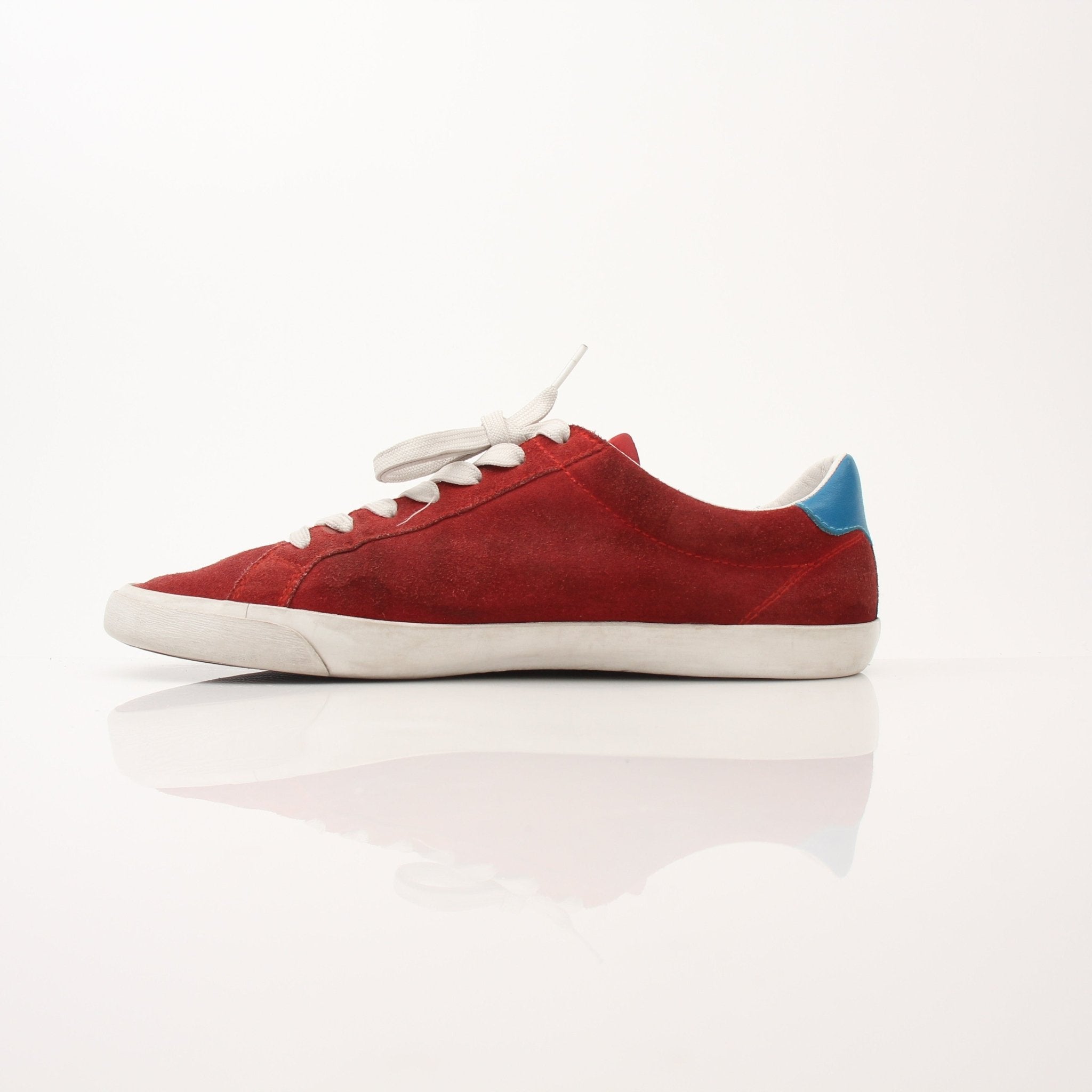 Gold & Beyond men's Dolce & Gabbana flat skating sneakers with stylish design, white leather upper, and skate-inspired sole.
