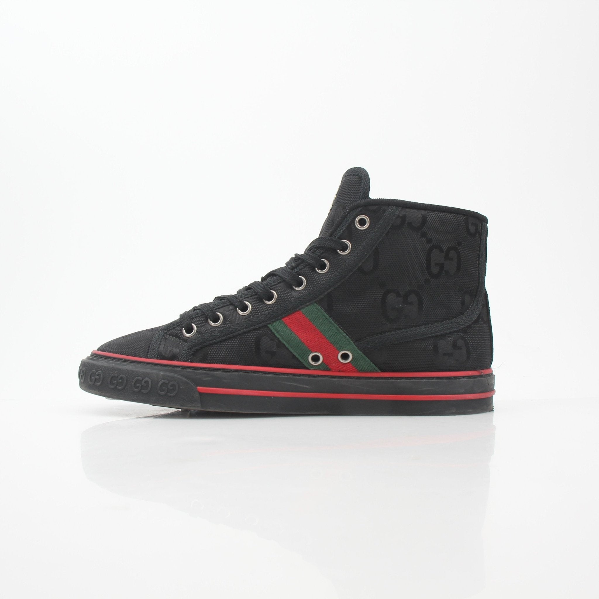 Gucci Black GG Tennis 1977 high-top sneakers with gold accents, featuring the iconic GG logo and classic athletic shoe design.