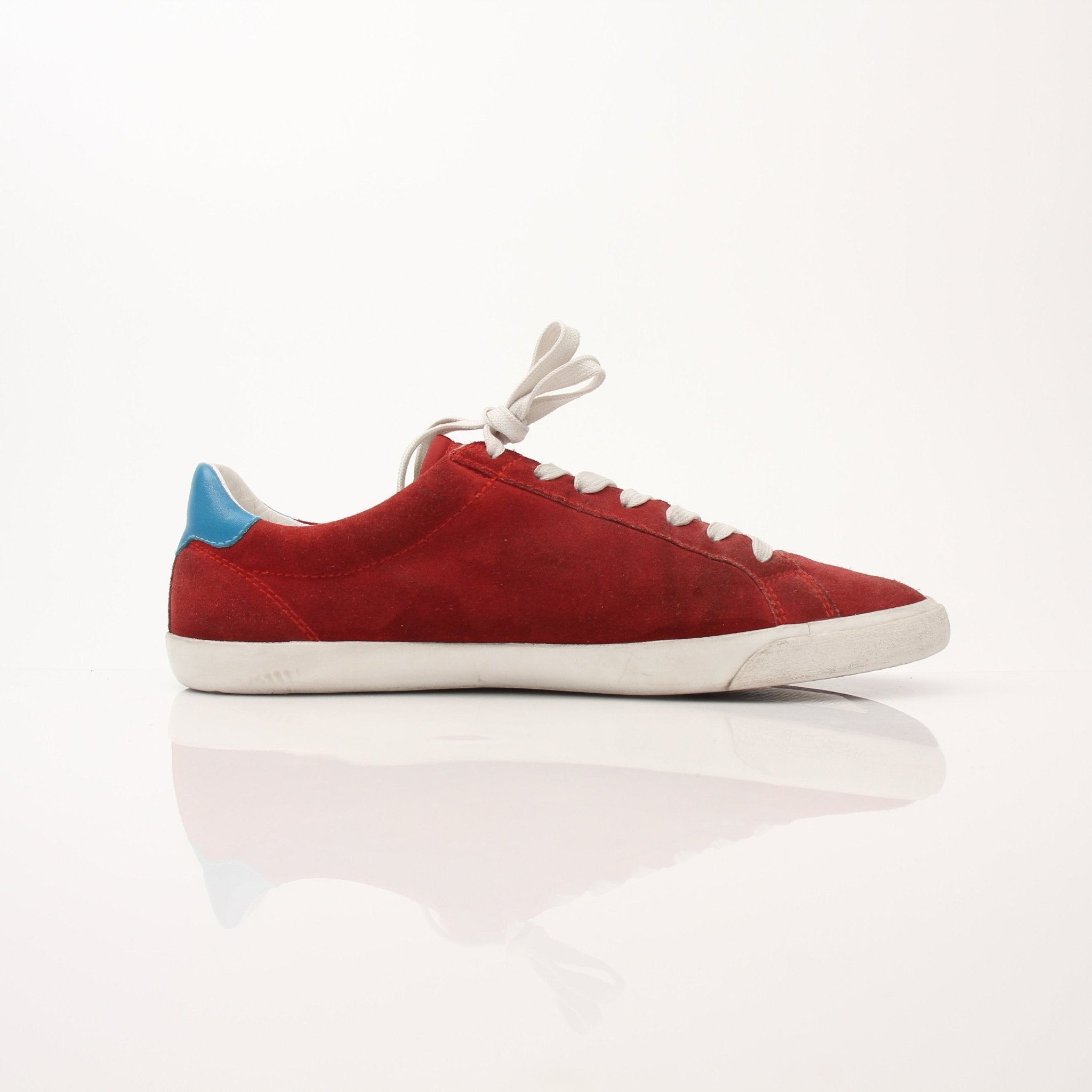 Gold & Beyond men's Dolce & Gabbana flat skating sneakers with stylish design and white laces, displayed on a neutral background.