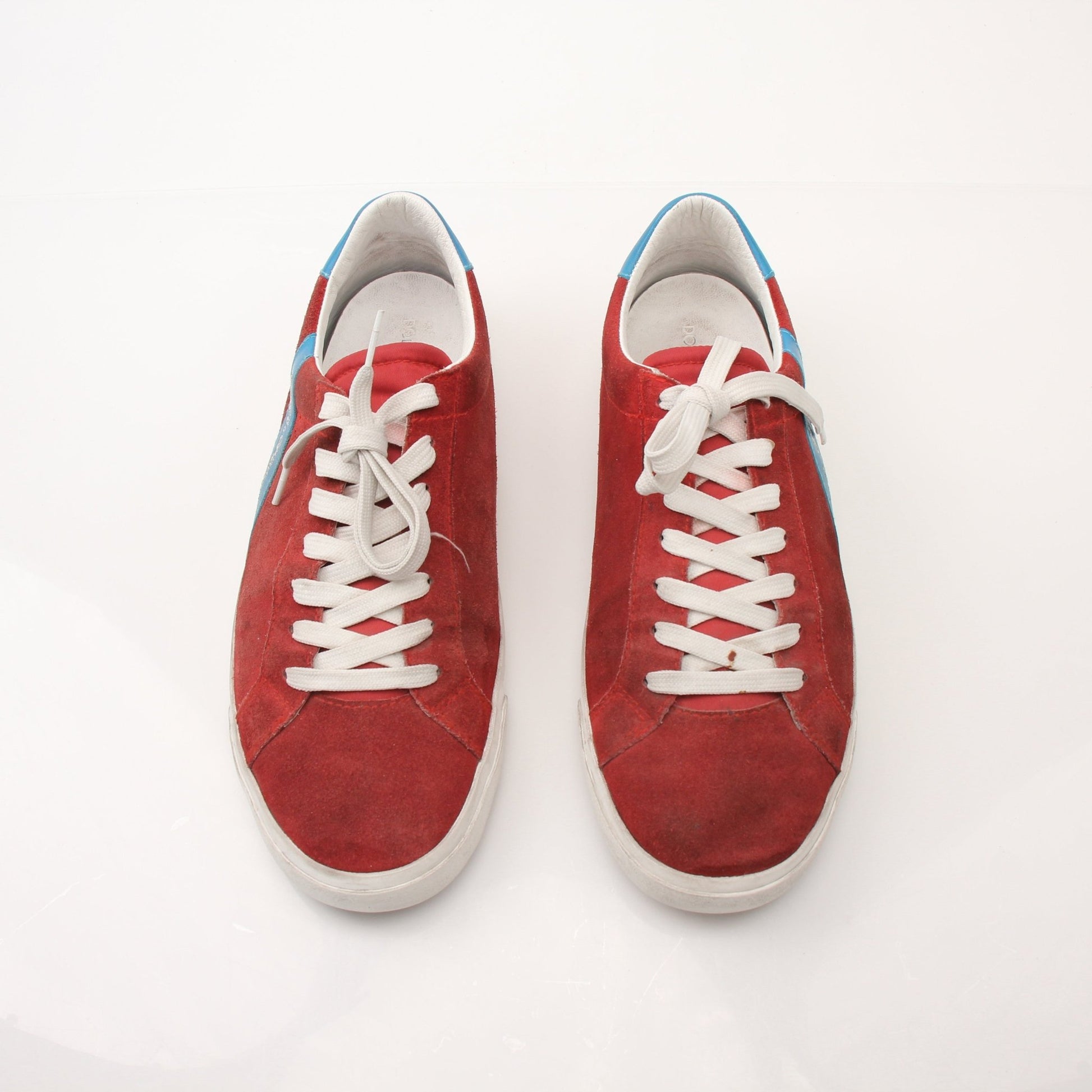 Gold & Beyond men's Dolce & Gabbana flat skating sneakers featuring sleek design and casual style.