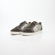 Christian Louboutin Silver Louis Junior Spikes Orlato sneakers featuring metallic finish and spike details on stylish shoes.