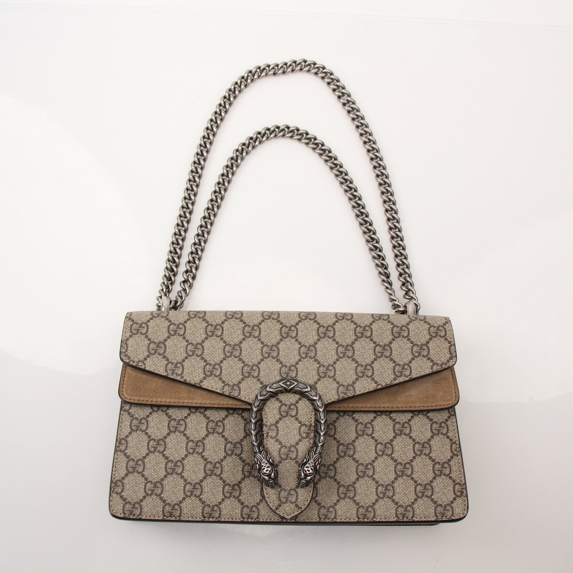 Gold & Beyond Gucci Dionysus shoulder handbag with signature GG logo, beige leather, and gold-tone hardware.