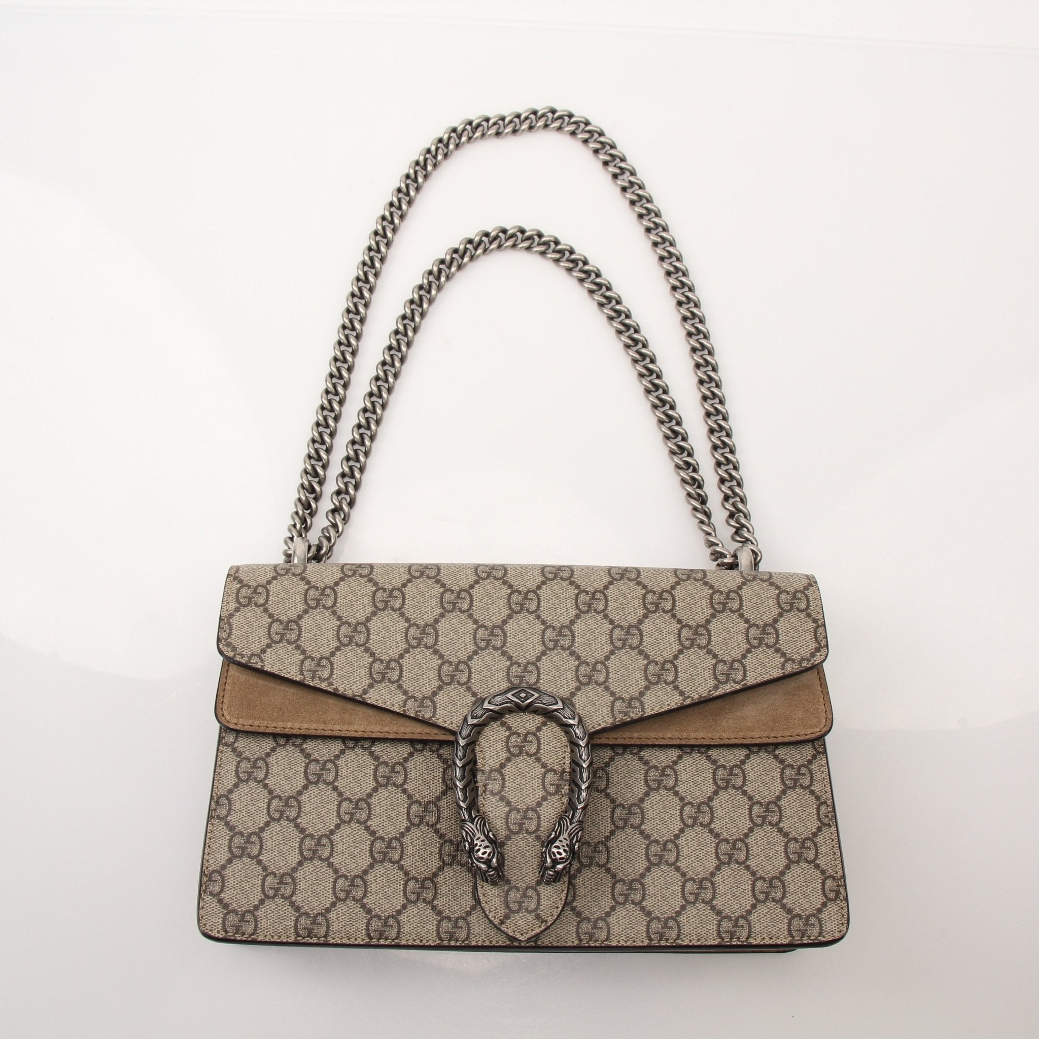 Gold & Beyond Gucci Dionysus shoulder handbag with signature GG logo, beige leather, and gold-tone hardware.