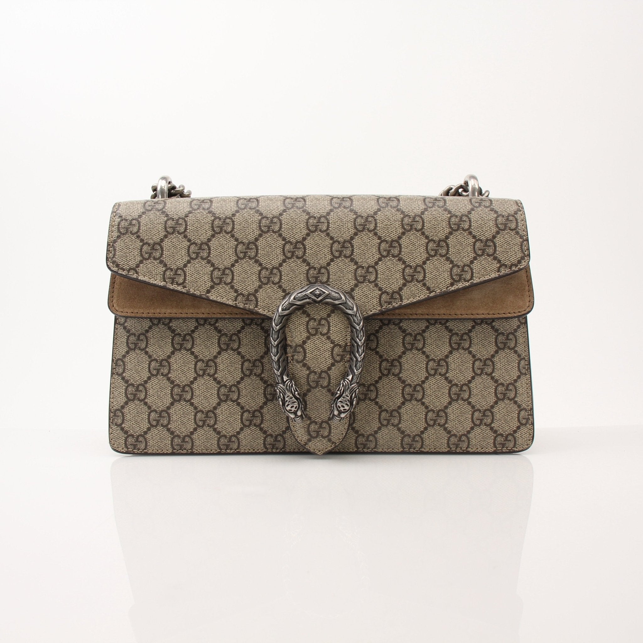 Gold & Beyond Gucci Dionysus shoulder handbag with signature tiger head closure and chain strap, crafted from textured leather.