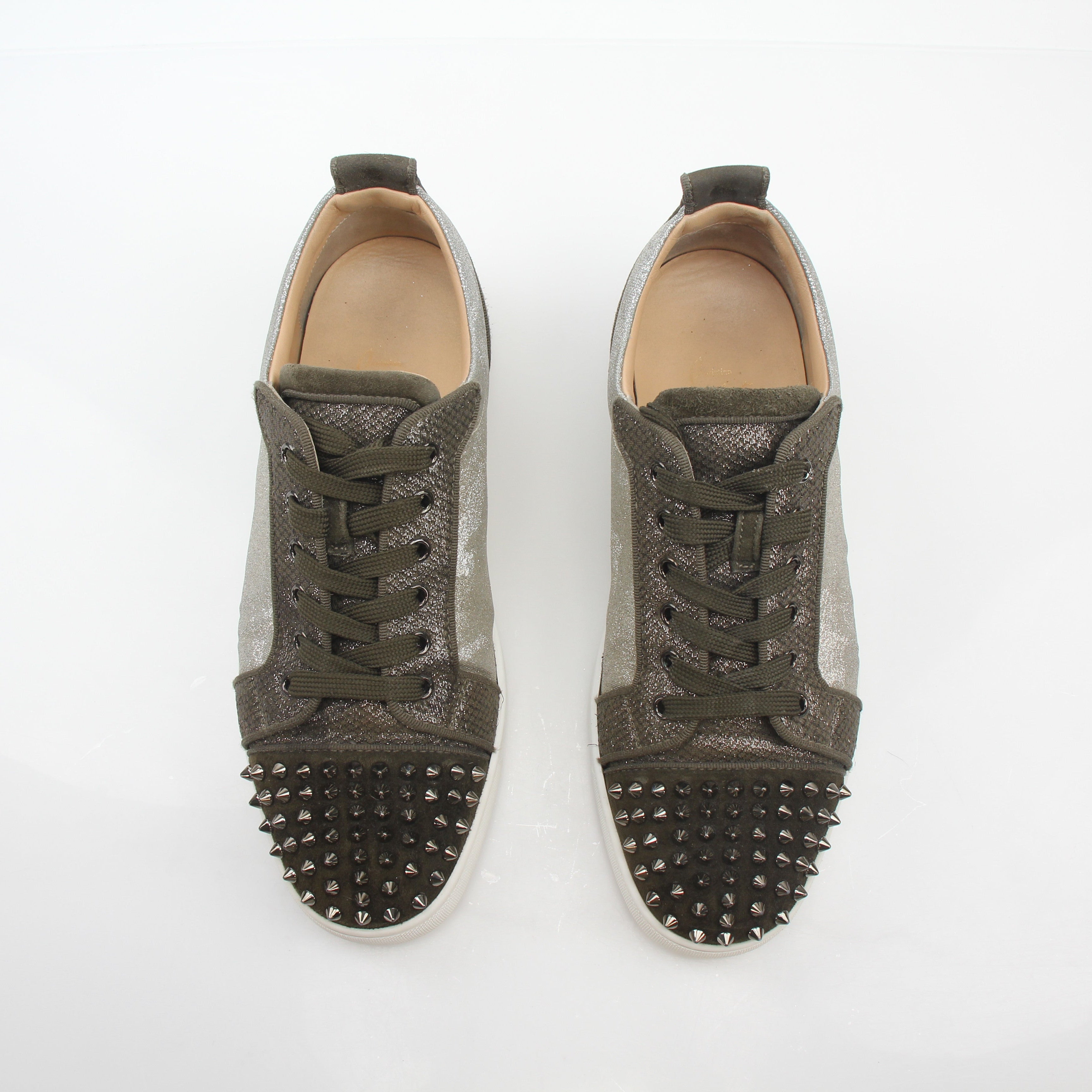 Christian Louboutin Silver Louis Junior Spikes Orlato sneakers with metallic finish and spike details, stylish shoes for men.