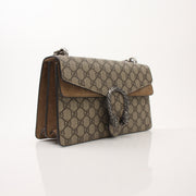 Gold & Beyond Gucci Dionysus shoulder handbag with tiger head closure and leather strap, stylish and luxurious accessory.