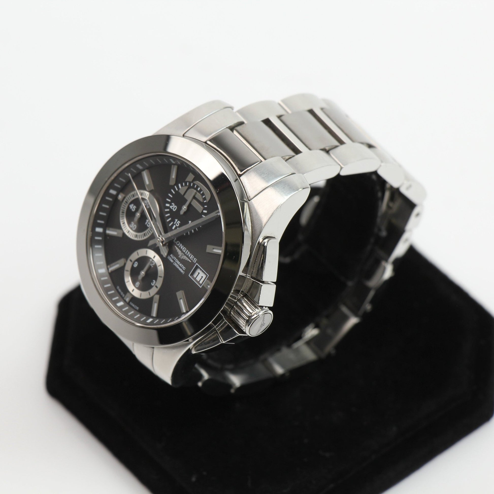 Gold & Beyond Longines automatic chronograph watch with stainless steel case and black dial, showcasing elegant watch design.
