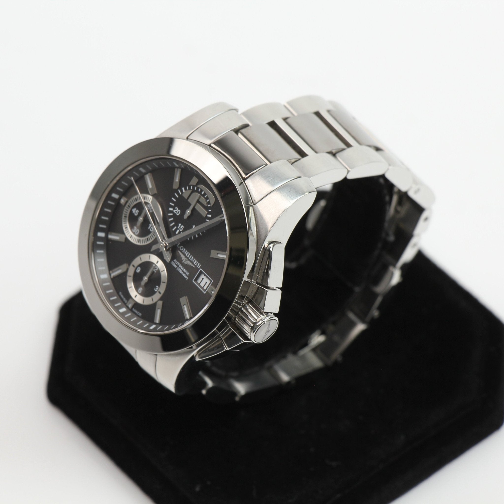 Gold & Beyond Longines automatic chronograph watch with stainless steel case and black dial, showcasing elegant watch design.