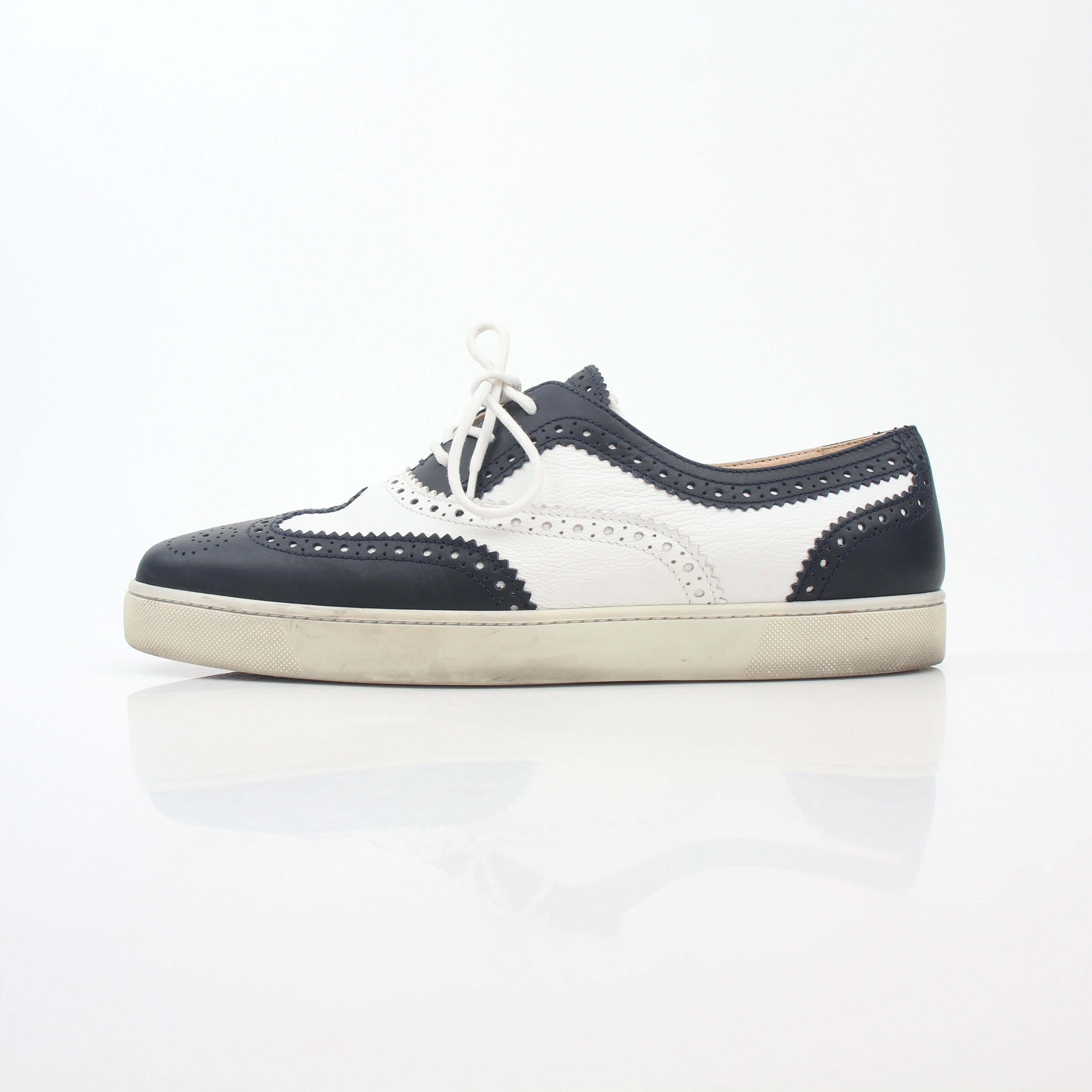 Christian Louboutin Navy and White Golfito Flat Sneakers, stylish shoes with navy and white color blocking, designed by Gold & Beyond.