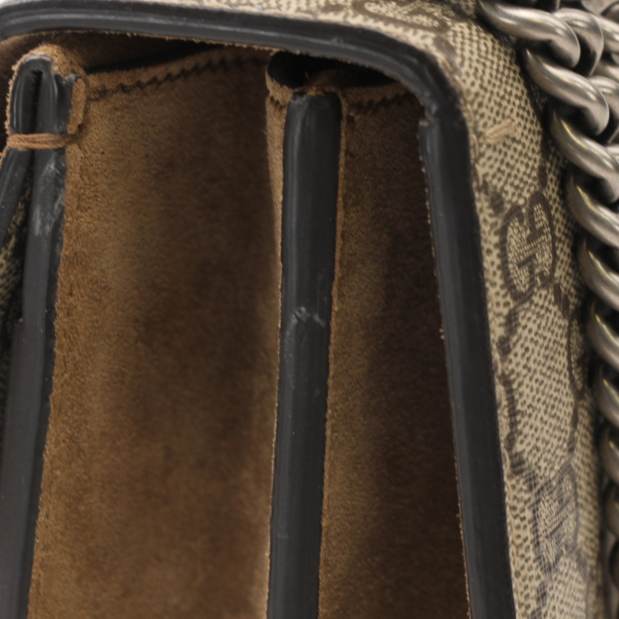 Gold & Beyond Gucci Dionysus shoulder handbag with textured leather, silver hardware, and signature tiger head clasp.
