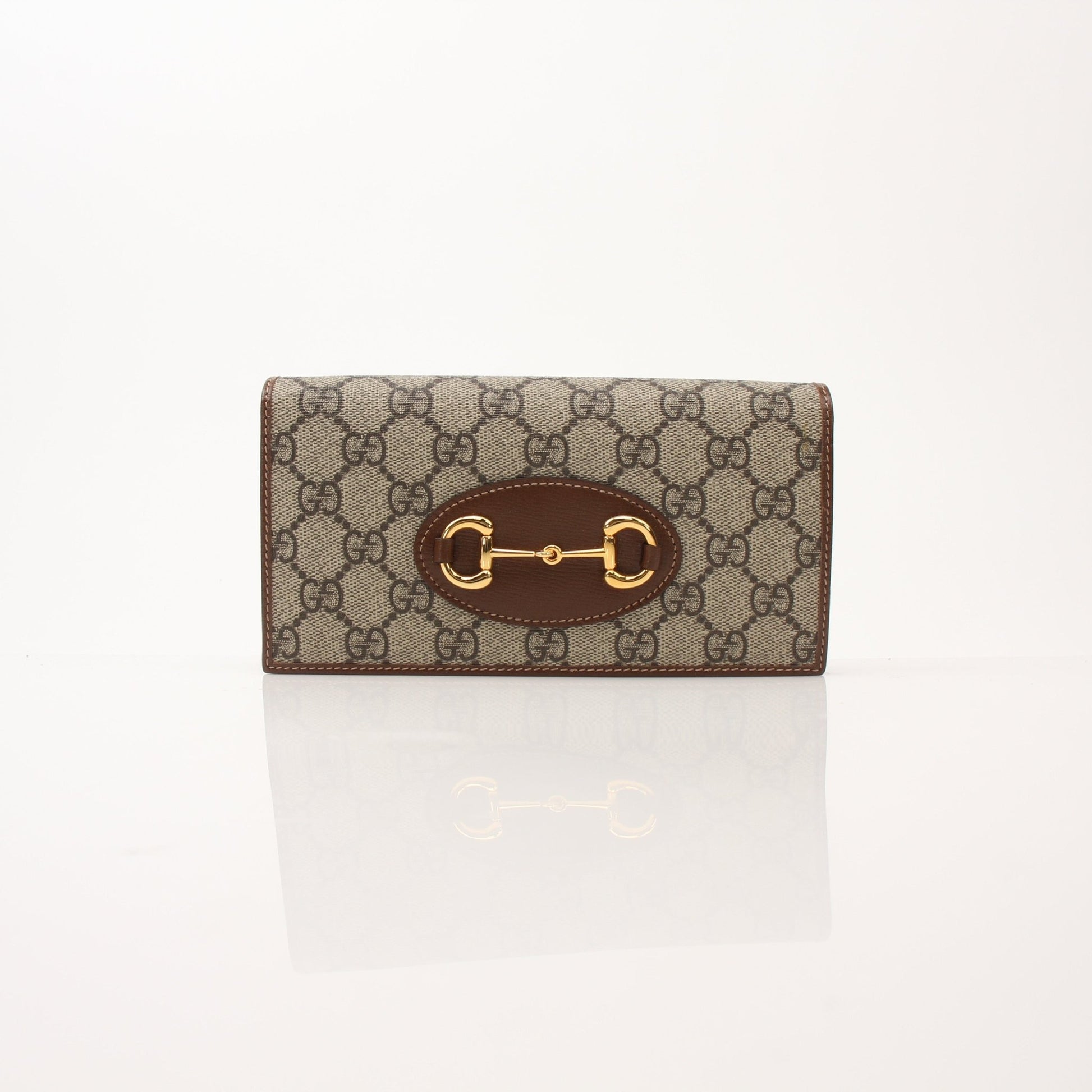 Gucci Azalea Horsebit Wallet on Chain handbag with floral design and gold hardware, featuring a chain strap and compact style.
