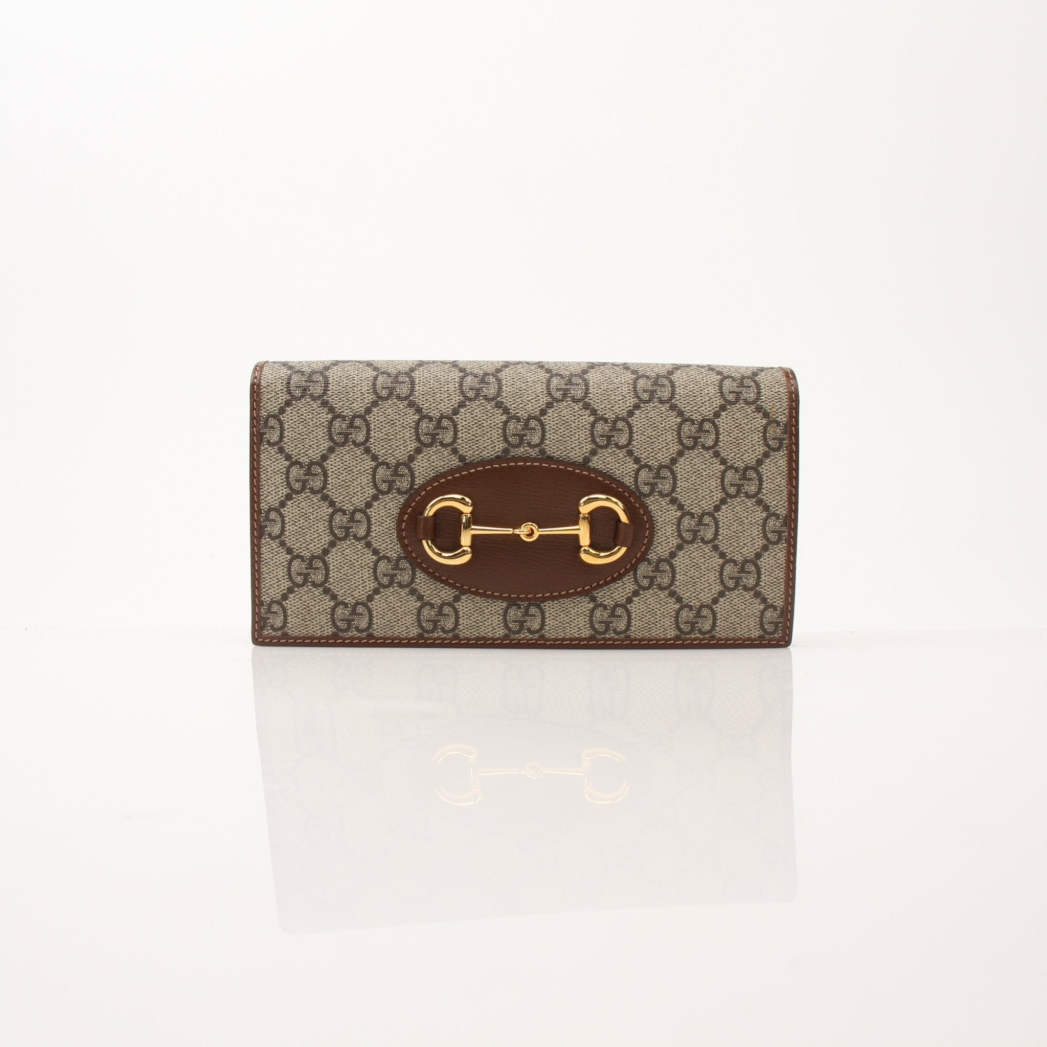 Gucci Azalea Horsebit Wallet on Chain handbag with floral design and gold hardware, featuring a chain strap and compact style.