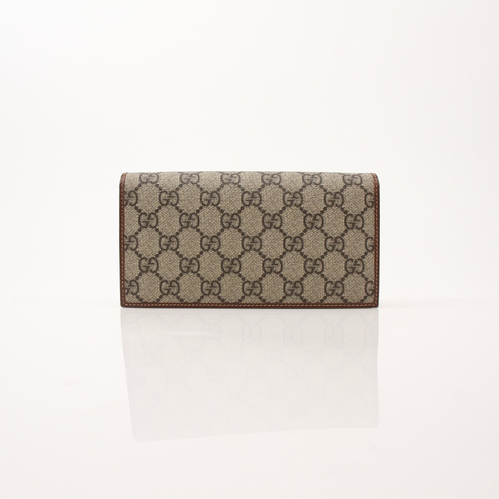 Gucci Azalea Horsebit Wallet on Chain handbag with gold accents, featuring a floral design and chain strap.