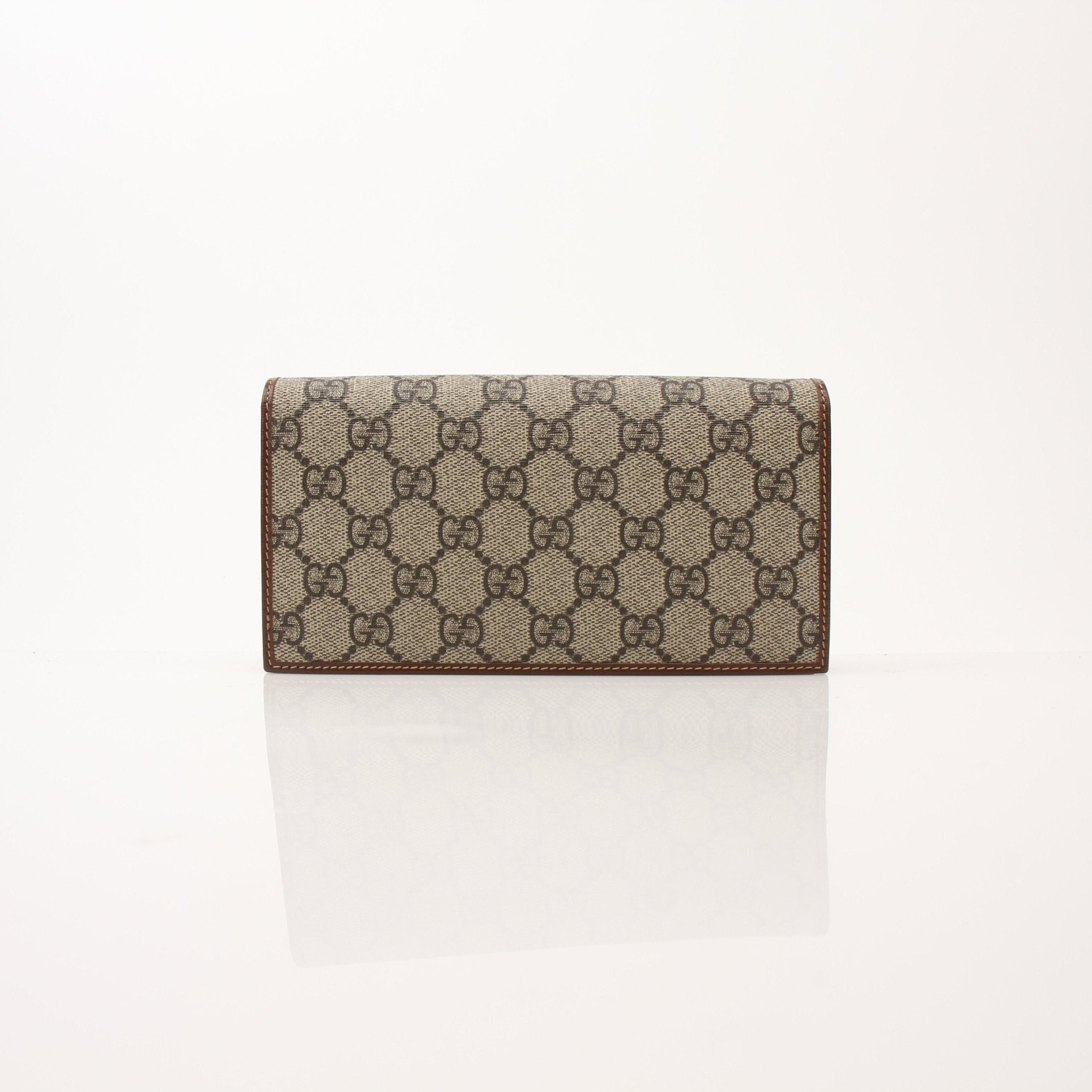 Gucci Azalea Horsebit Wallet on Chain handbag with gold accents, featuring a floral design and chain strap.