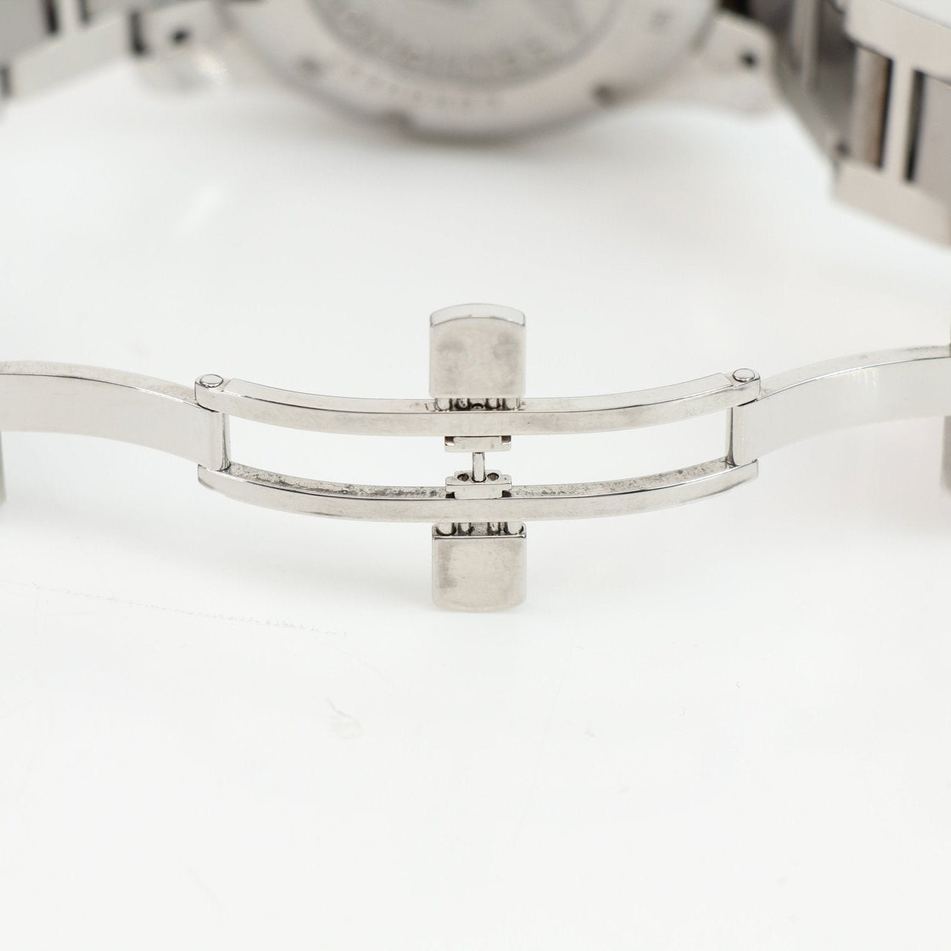 Gold & Beyond Longines automatic chronograph watch with black dial, stainless steel bracelet, and multiple subdials.