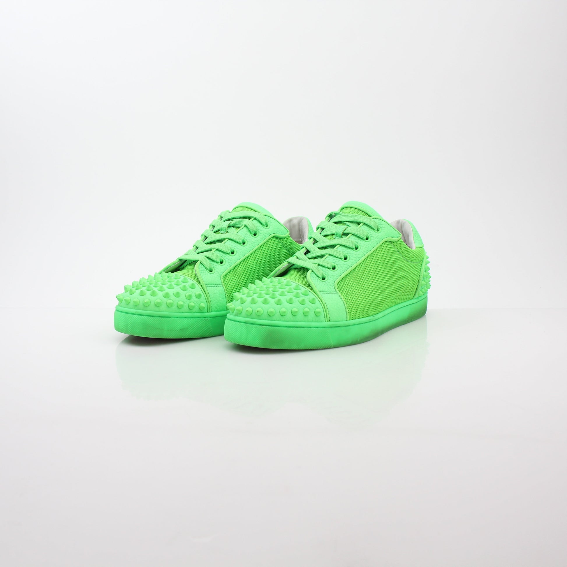 Christian Louboutin Green Seavaste 2 Orlato sneakers, stylish shoes with vibrant green color and signature design details.