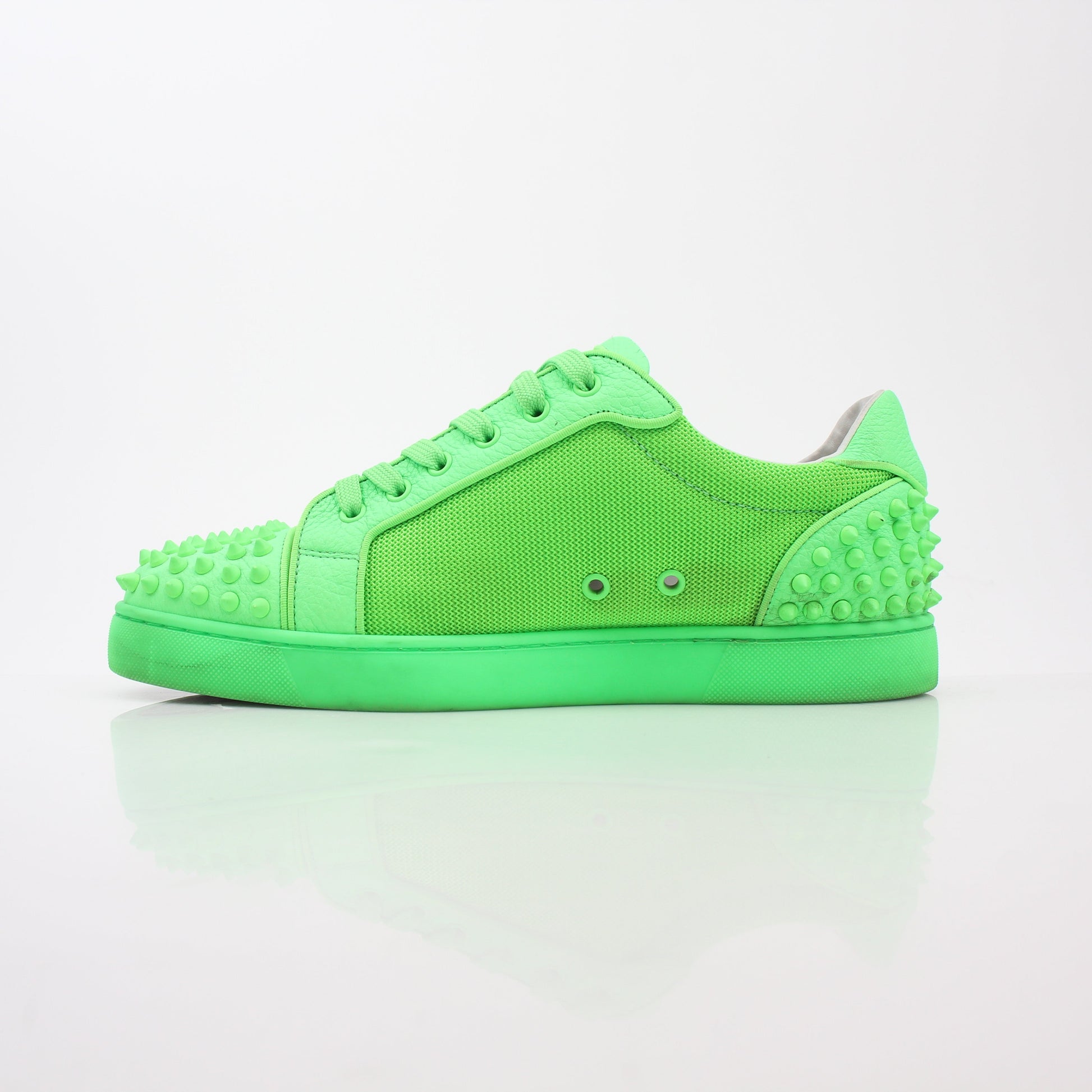 Christian Louboutin Green Seavaste 2 Orlato sneakers by Gold & Beyond, featuring vibrant green color and stylish shoe design.